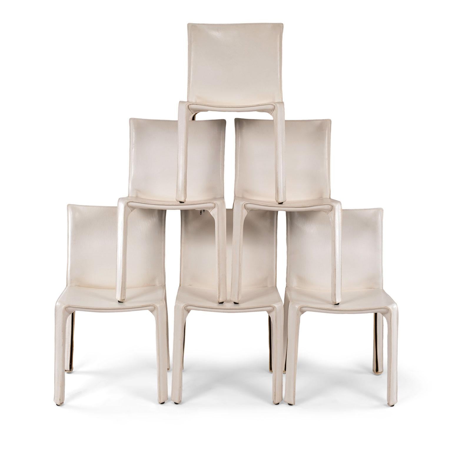 Six white vintage Mario Bellini cab 412 side chairs, fabricated by Cassina in the 1980s. Flexible steel frame covered with a skin of high quality white saddle leather. This elegant, versatile chair is equally suitable for the dining room, study or