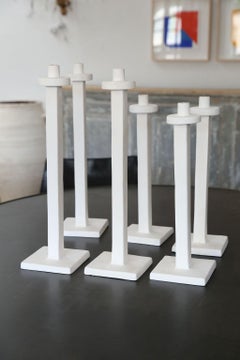 Six White Plaster Candlesticks