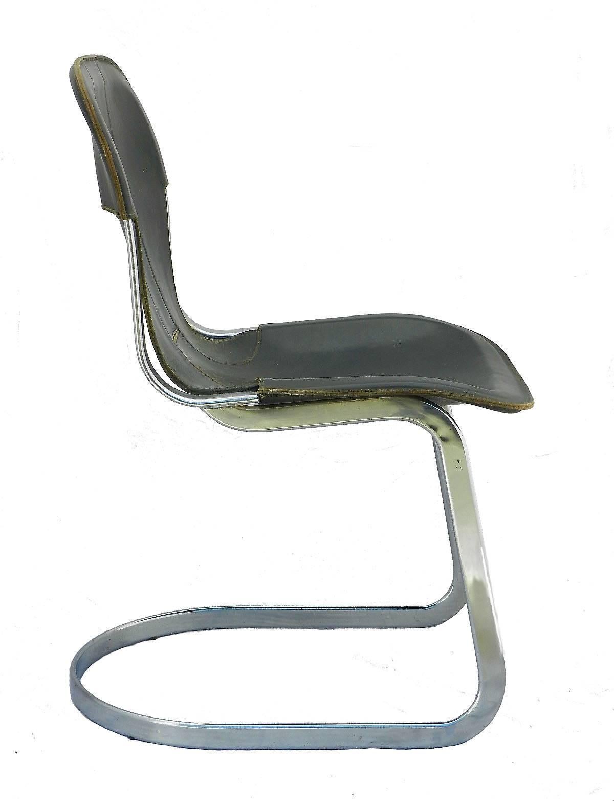 Six Willy Rizzo dining chairs for Cidue Italy chrome leather.
Willy Rizzo dining chairs produced by Cidue.
Saddle leather seats with good vintage patina and signs if use with some minor restorations.
Tubular chrome-plated steel frames with some