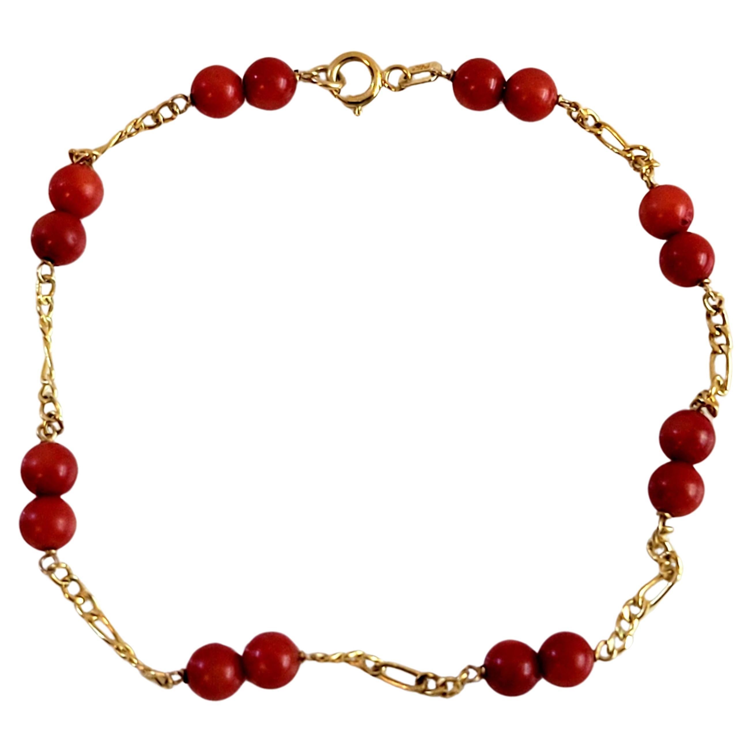 Sixteen Coral Red Bead Women Bracelet in 14k Yellow Gold