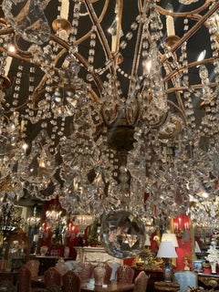 Sixteen light beaded and gilt metal chandelier
