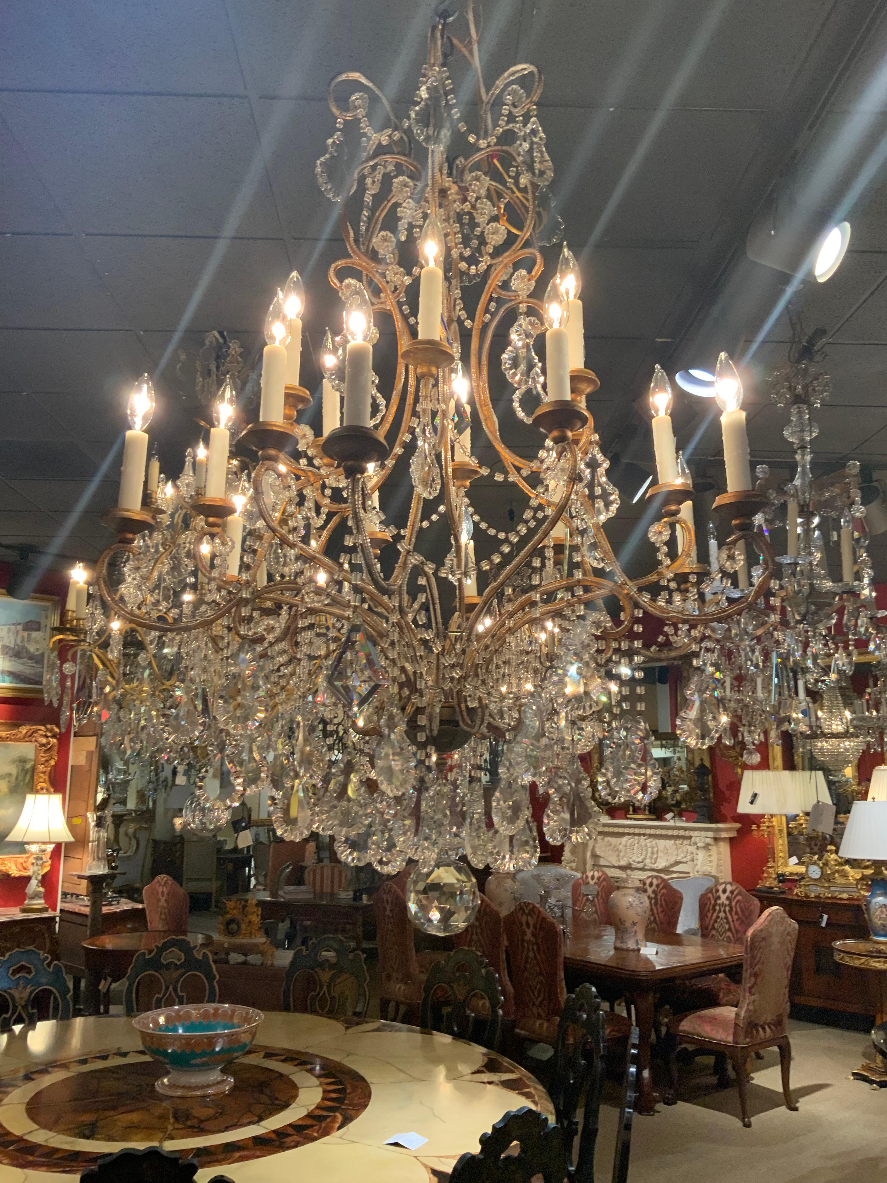 Italian Sixteen light beaded and gilt metal chandelier  For Sale