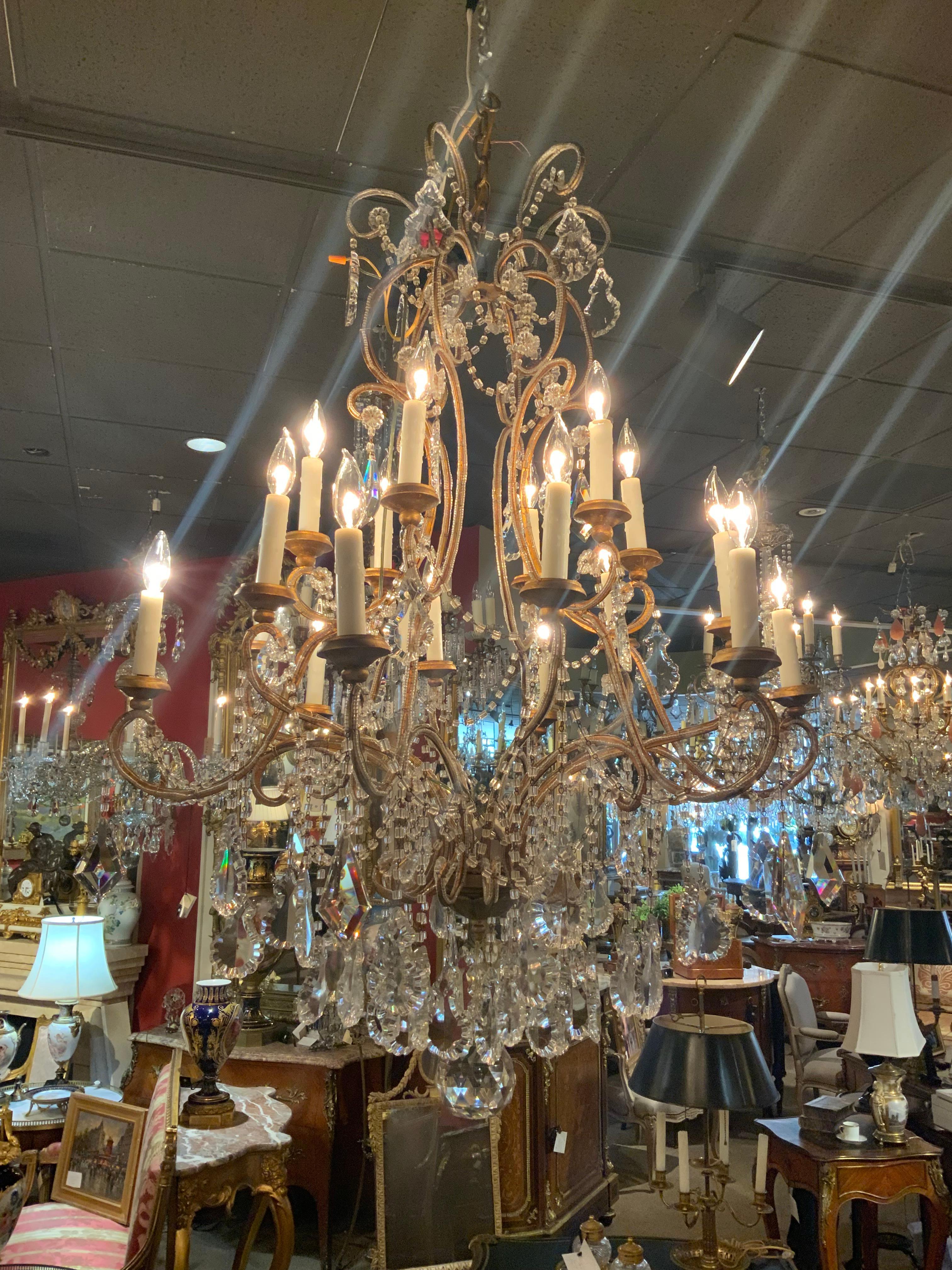 Sixteen light beaded and gilt metal chandelier  For Sale 1