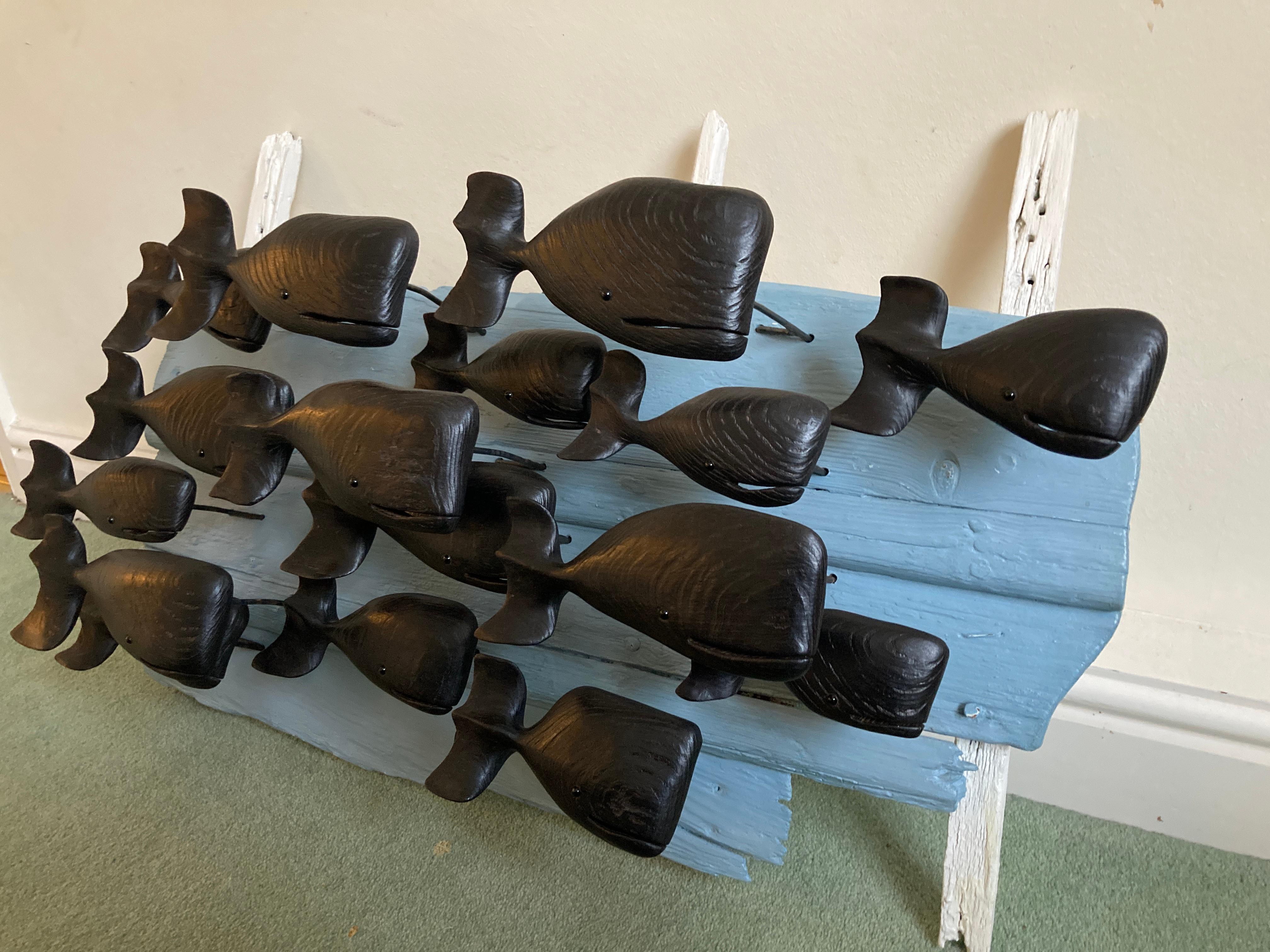Hand-Carved Sixteen Whales by Max Tannahill For Sale