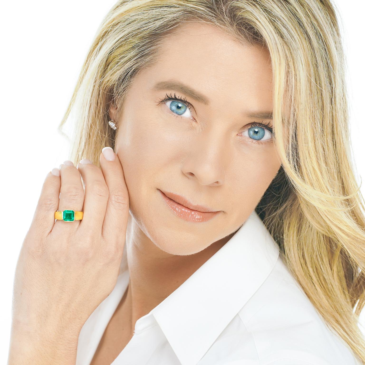 Circa 1960s, 18k, American.   The 3.0 carat emerald in this fabulous sixties ring has gorgeous color and lively passage of light. Its postmodern design is perfect for today's understated off-hand chic. Meticulously made in 18k yellow gold, it is in