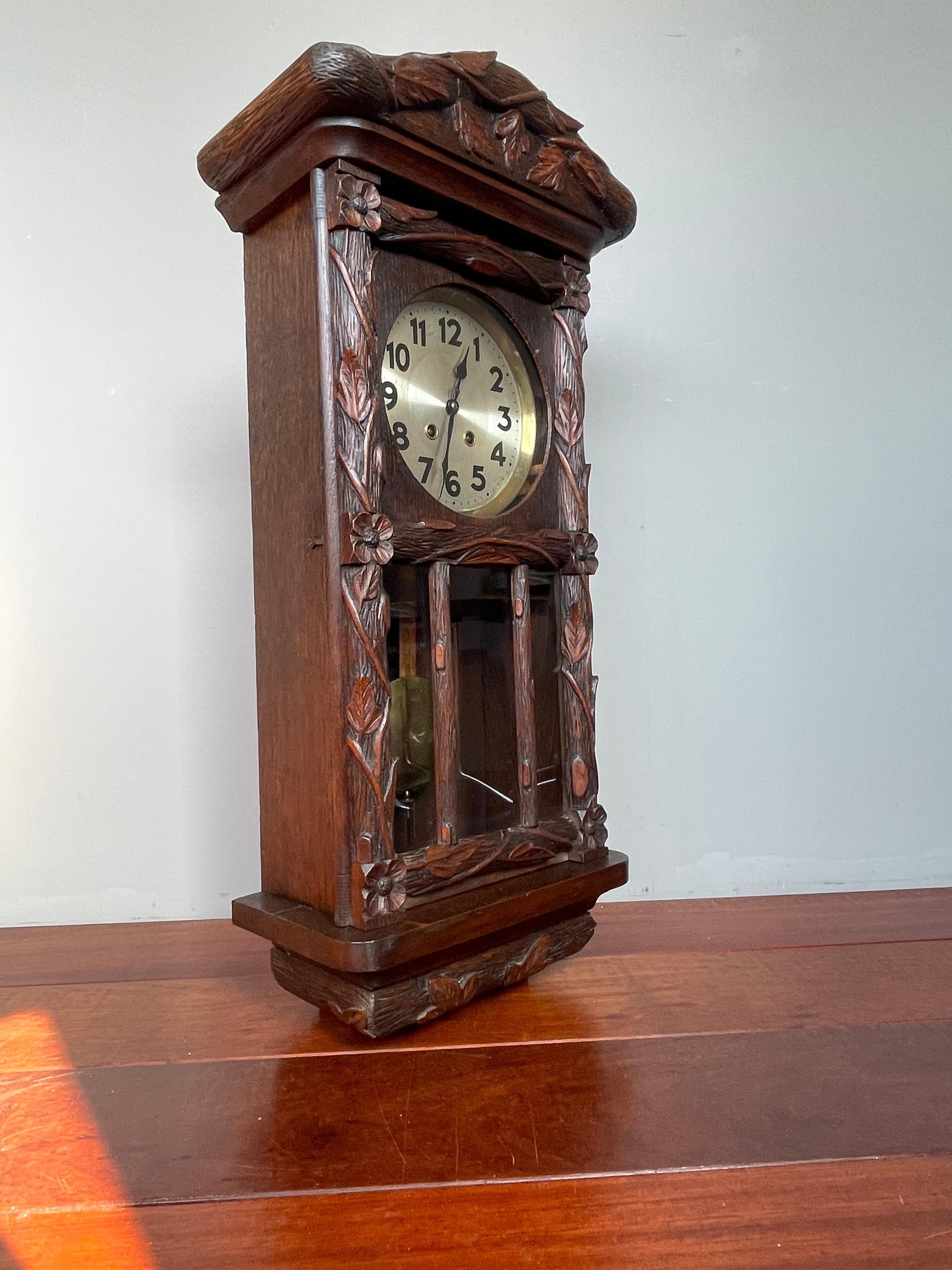 20th Century Sizable Antique & Hand-Carved Black Forest Wooden Wall Clock w. Brass Pendulum