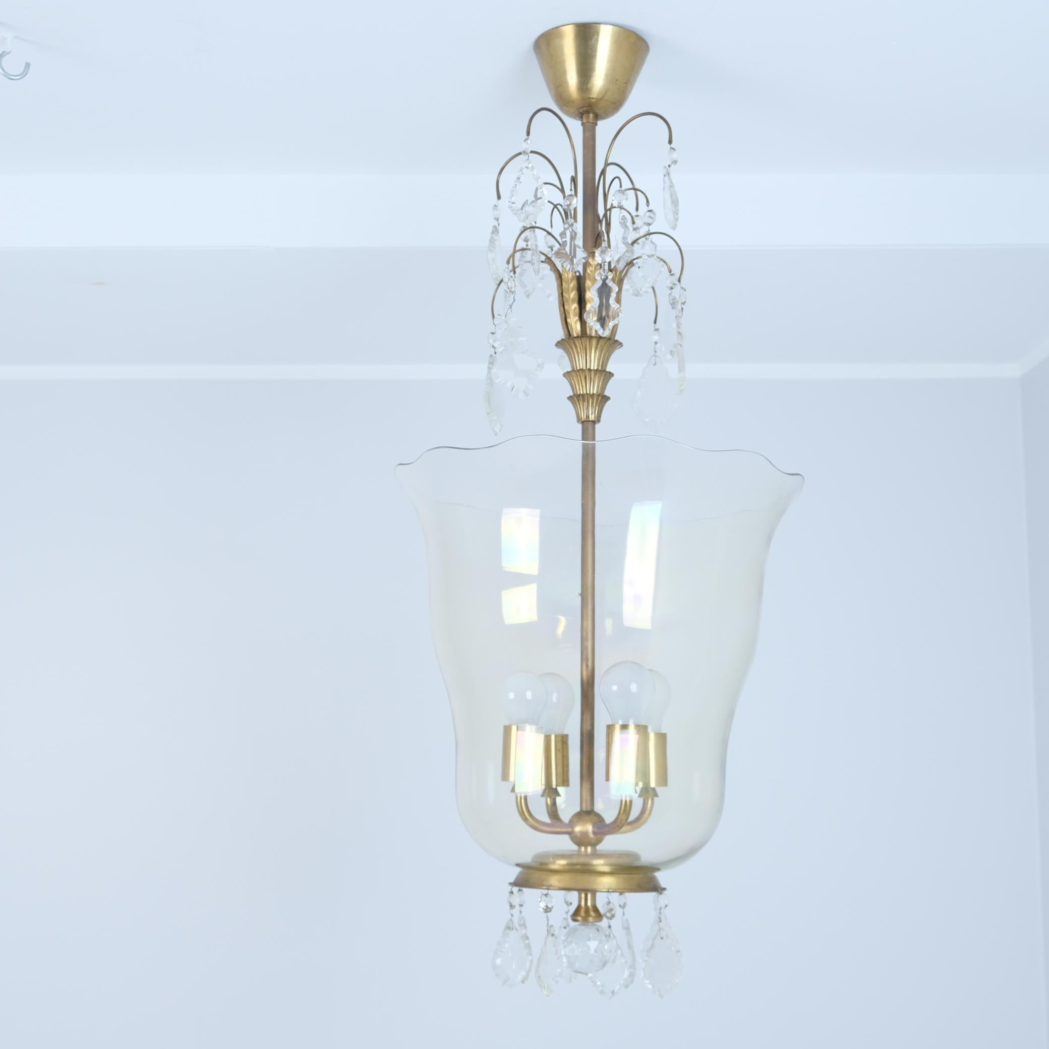 A large and exceptionally rare ceiling lamp by Paavo Tynell and Gunnel Nyman from the 1930s manufactured by Taito Oy and the art glass shade by Riihimäen Lasi Oy. A stunning work of craftsmanship and artistic design combining art glass by Nyman who