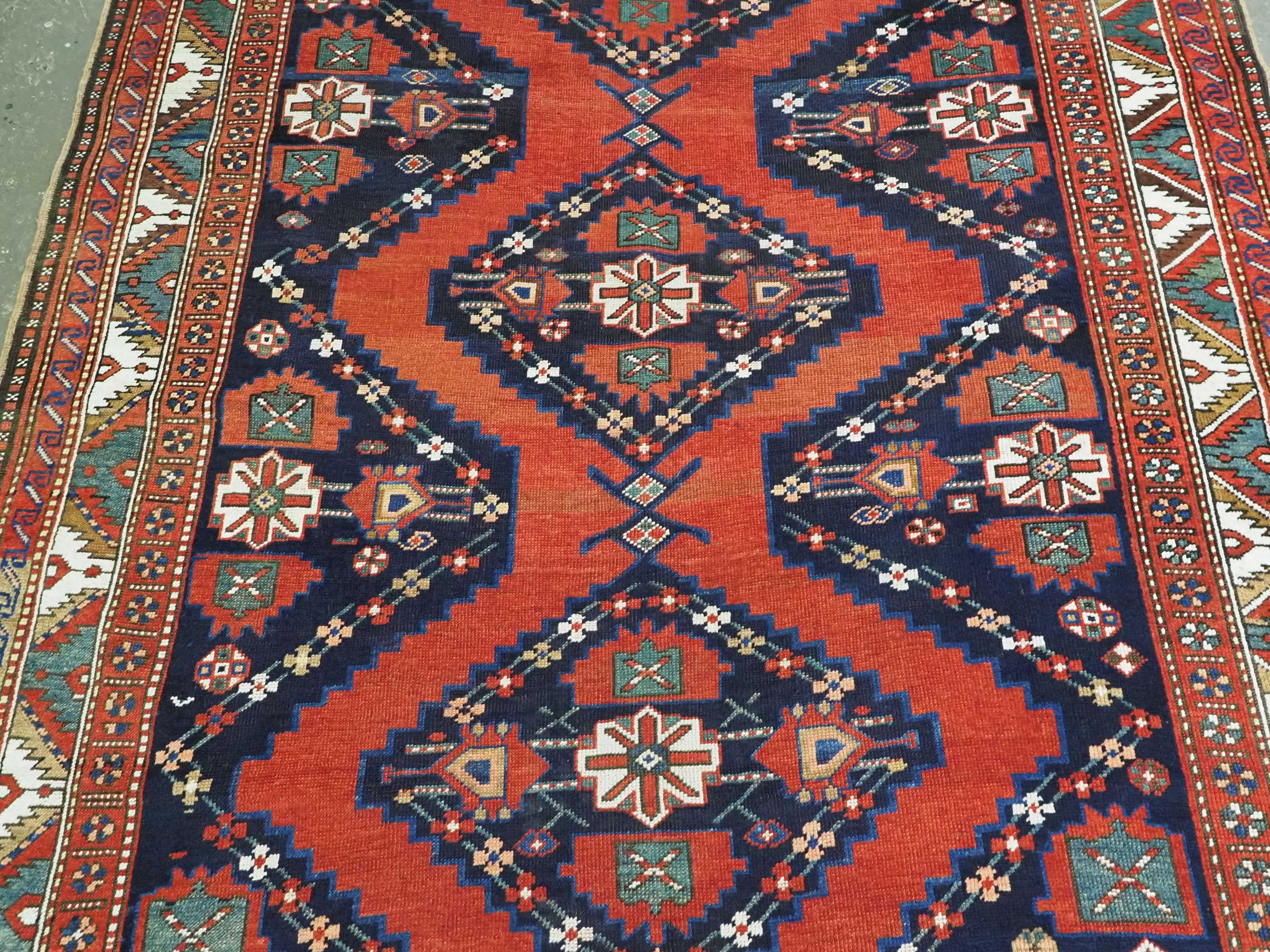 Wool Size: 10ft 7in x 6ft 0in (323 x 183cm).  Antique South Caucasian Karabagh Kazak  For Sale