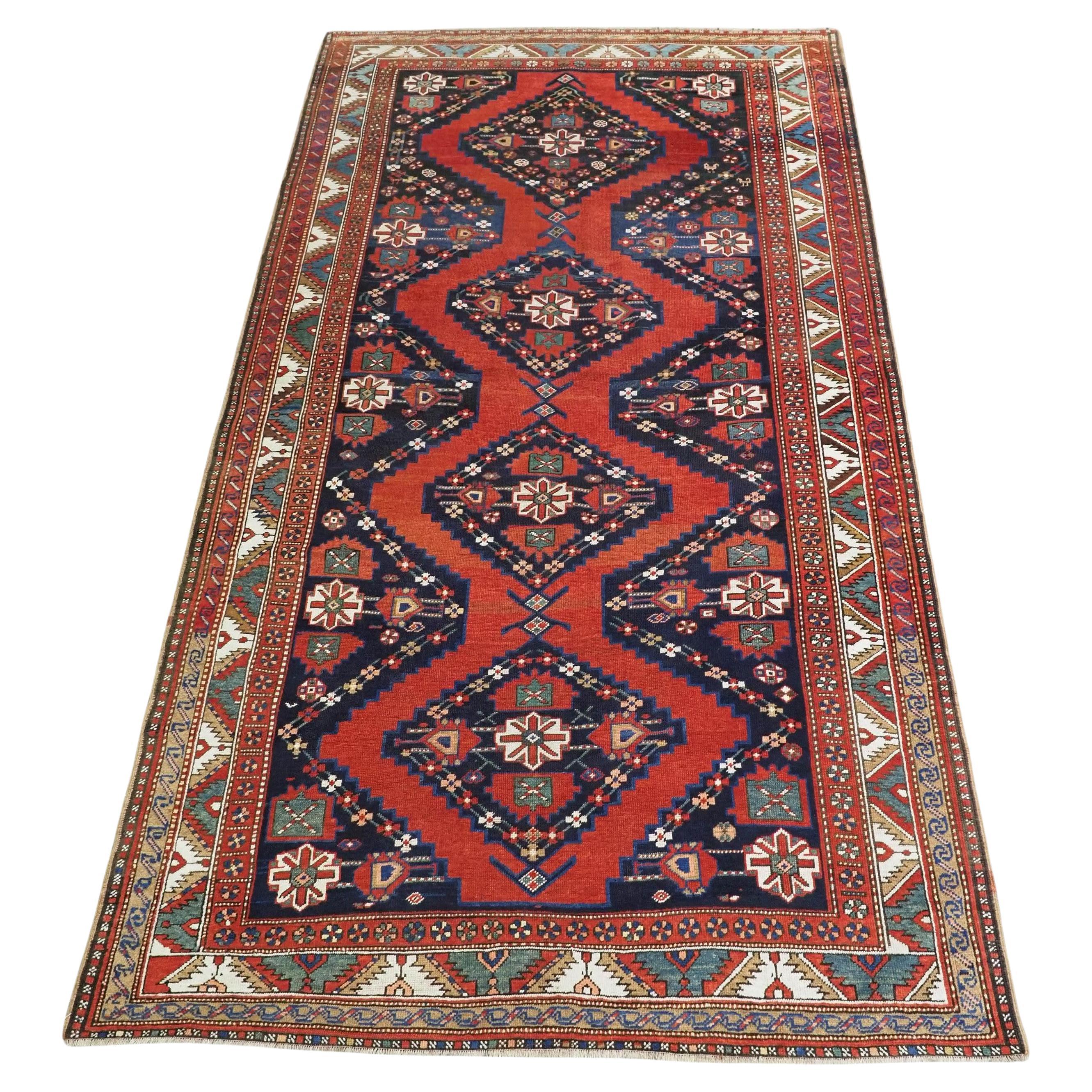 Size: 10ft 7in x 6ft 0in (323 x 183cm).  Antique South Caucasian Karabagh Kazak  For Sale