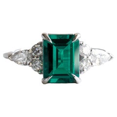Size 6.5, 14K White Gold 1.5 Carat Lab Emerald & Lab Diamond Engagement Ring