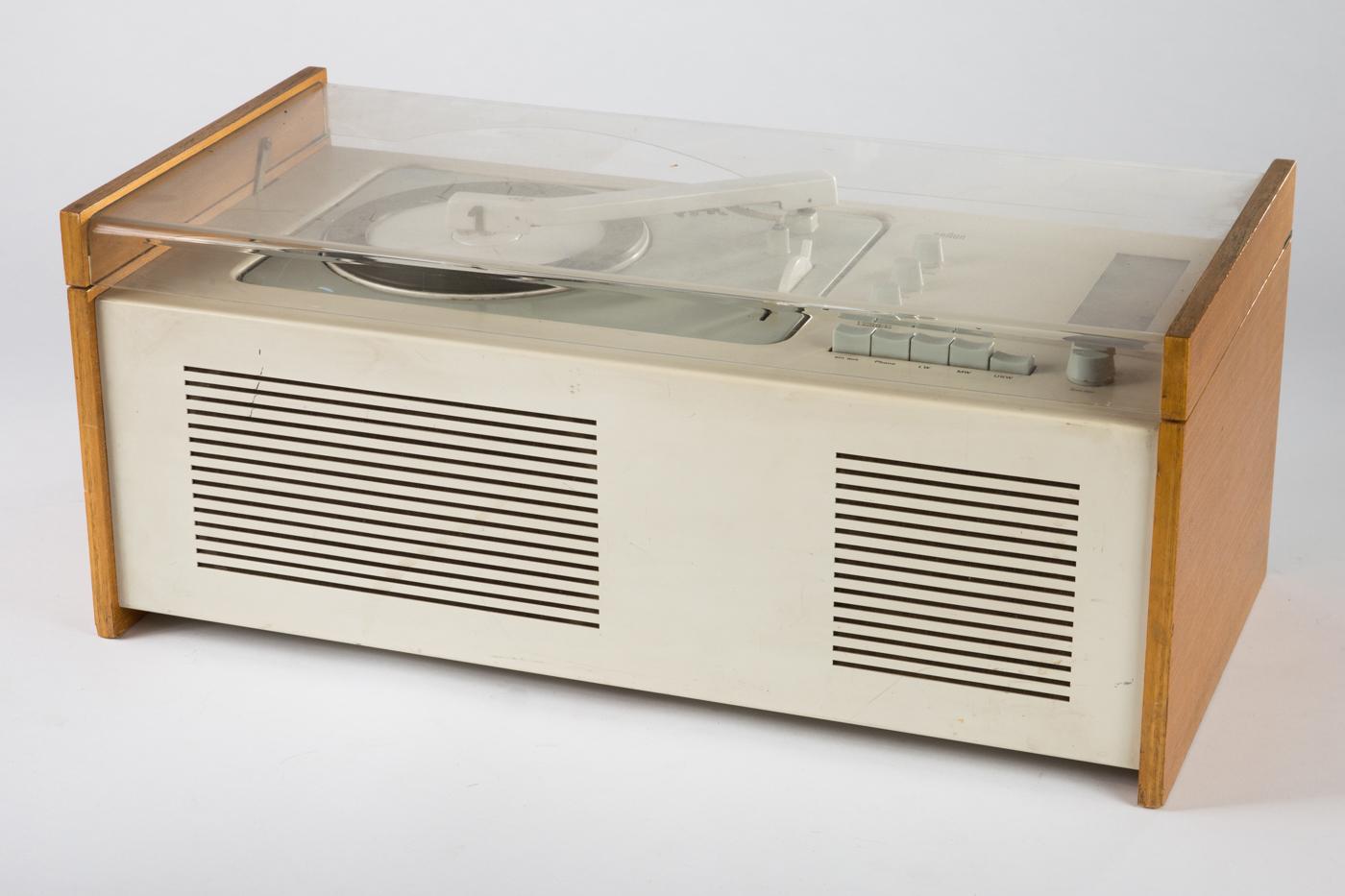 SK61 Record Player designed by Dieter Rams and Hans Gugelot for Braun, 1966. The radio-phonograph combination is in excellent cosmetic condition, and full working order. 
It has a four speed record player, 78, 45, 33, 16 rpm. The tube radio picks