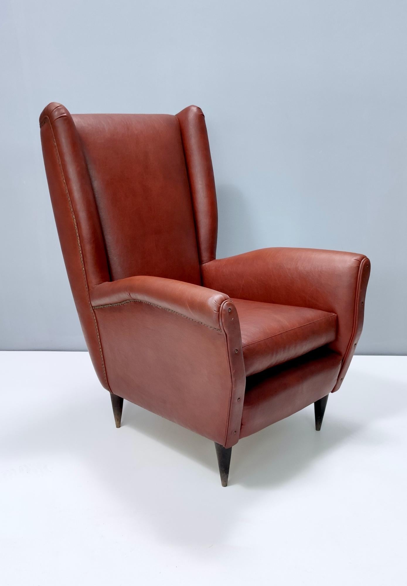 Italian Skai Wingback Armchair Ascribable to Mod. 512 attr. to Gio Ponti Produced by ISA For Sale