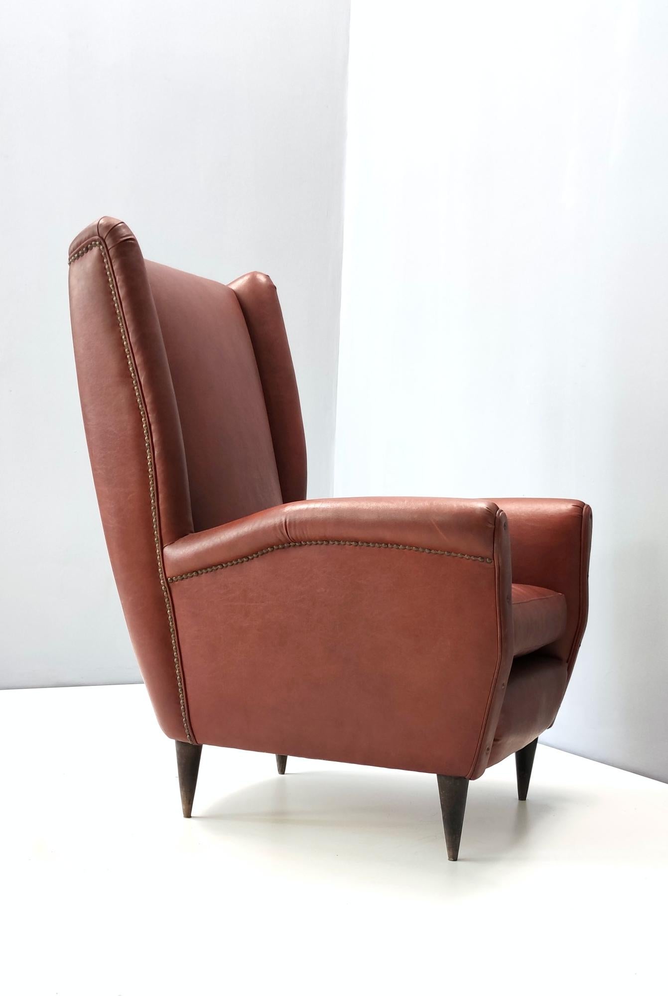 Ebonized Skai Wingback Armchair Ascribable to Mod. 512 attr. to Gio Ponti Produced by ISA For Sale