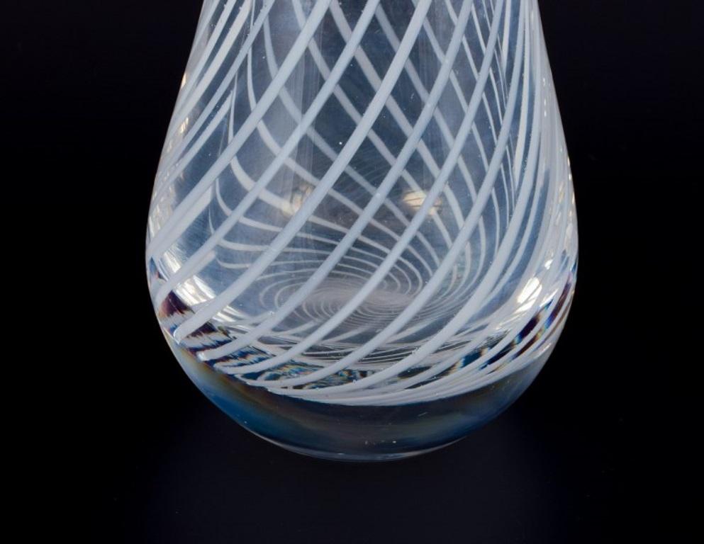 Skandinavian glass artist. Art glass vase in clear glass with white lines In Excellent Condition For Sale In Copenhagen, DK