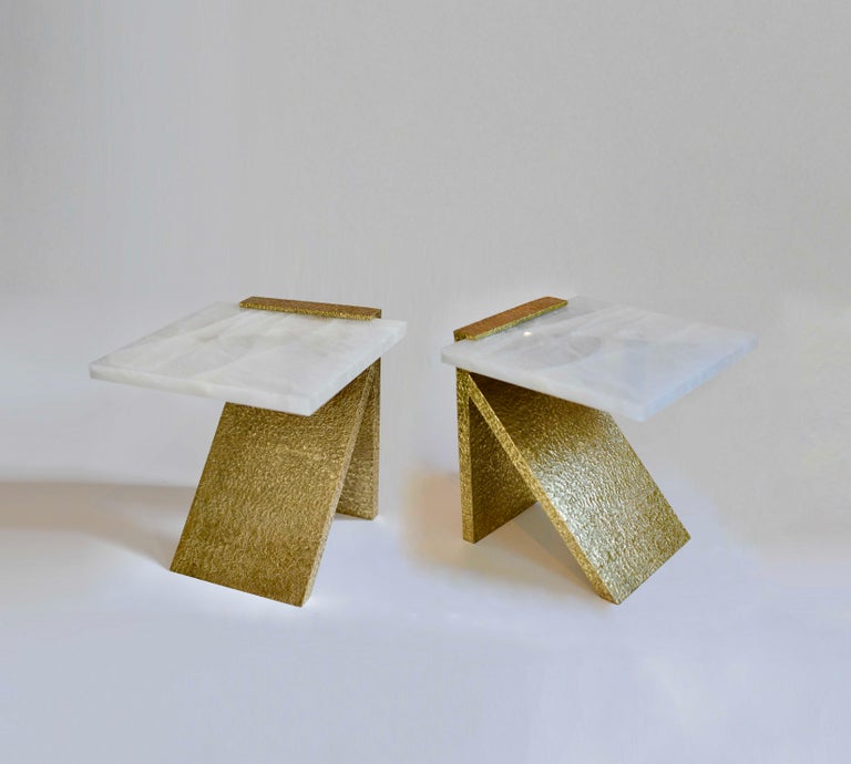 Pair of hammered brass stands with white rock crystal tabletops. Created by Phoenix gallery. 
Custom size upon request.