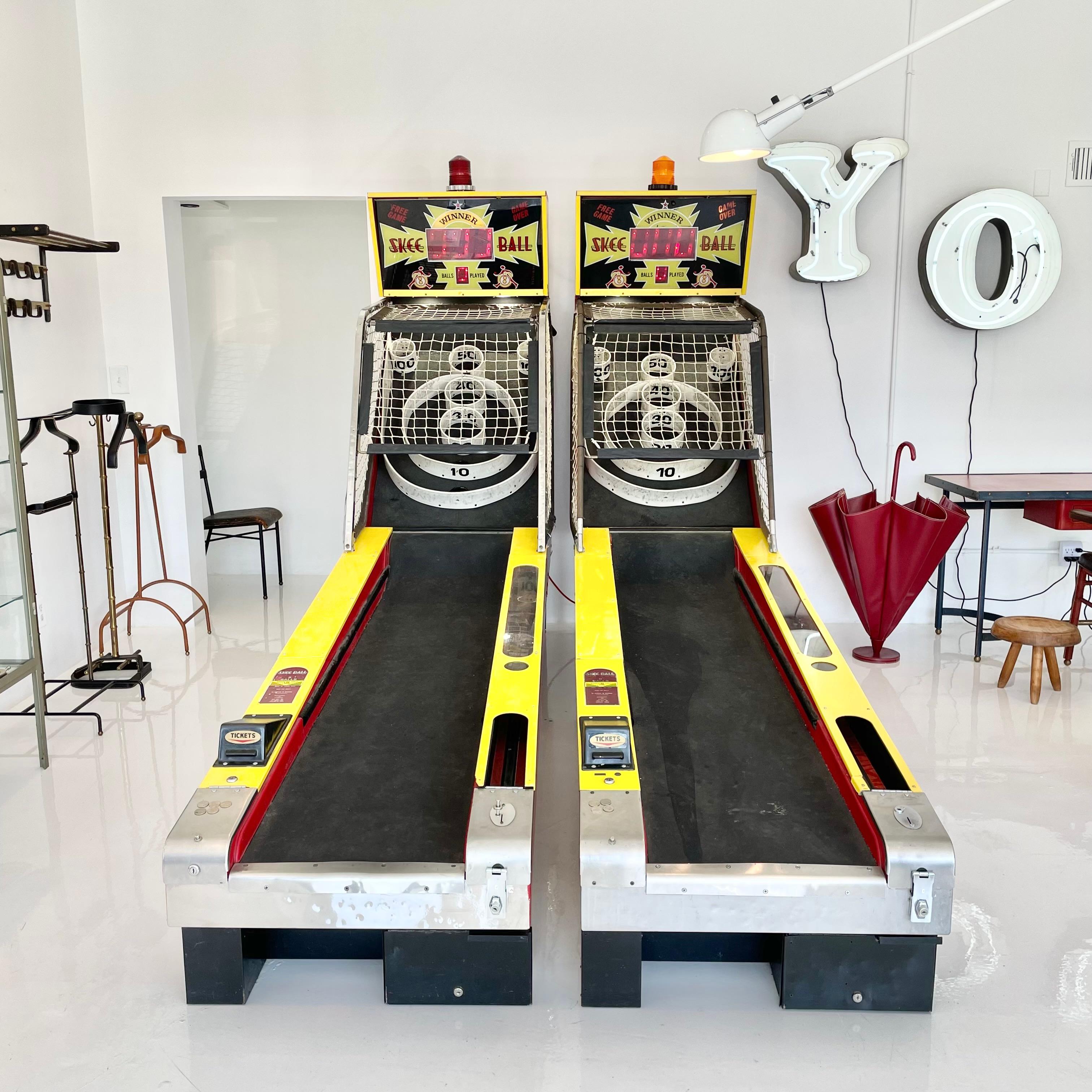 Cool vintage Skee-Ball machine in great working condition. 9 vintage wood balls included. Coin-operated with light up scoreboard. Ball alley is topped with a resilient black rubber that is still in great condition and helps preserve the life of the