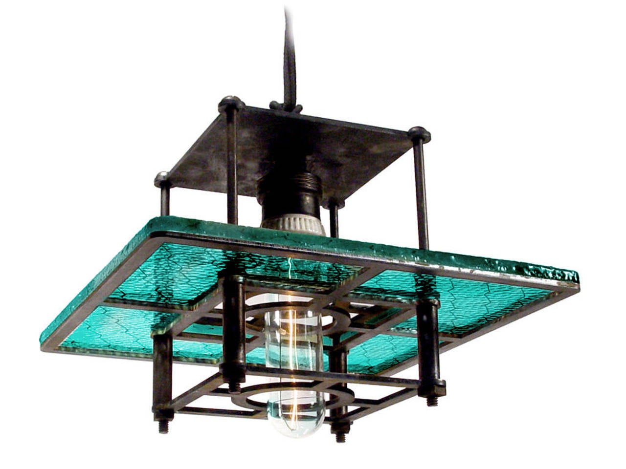 This is one of the first lamps The Early Electrics Design Studio introduced and featured a rare blue green Industrial glass. It quickly sold out. It took a couple of years to discover another collection of this hard to find color glass and can offer