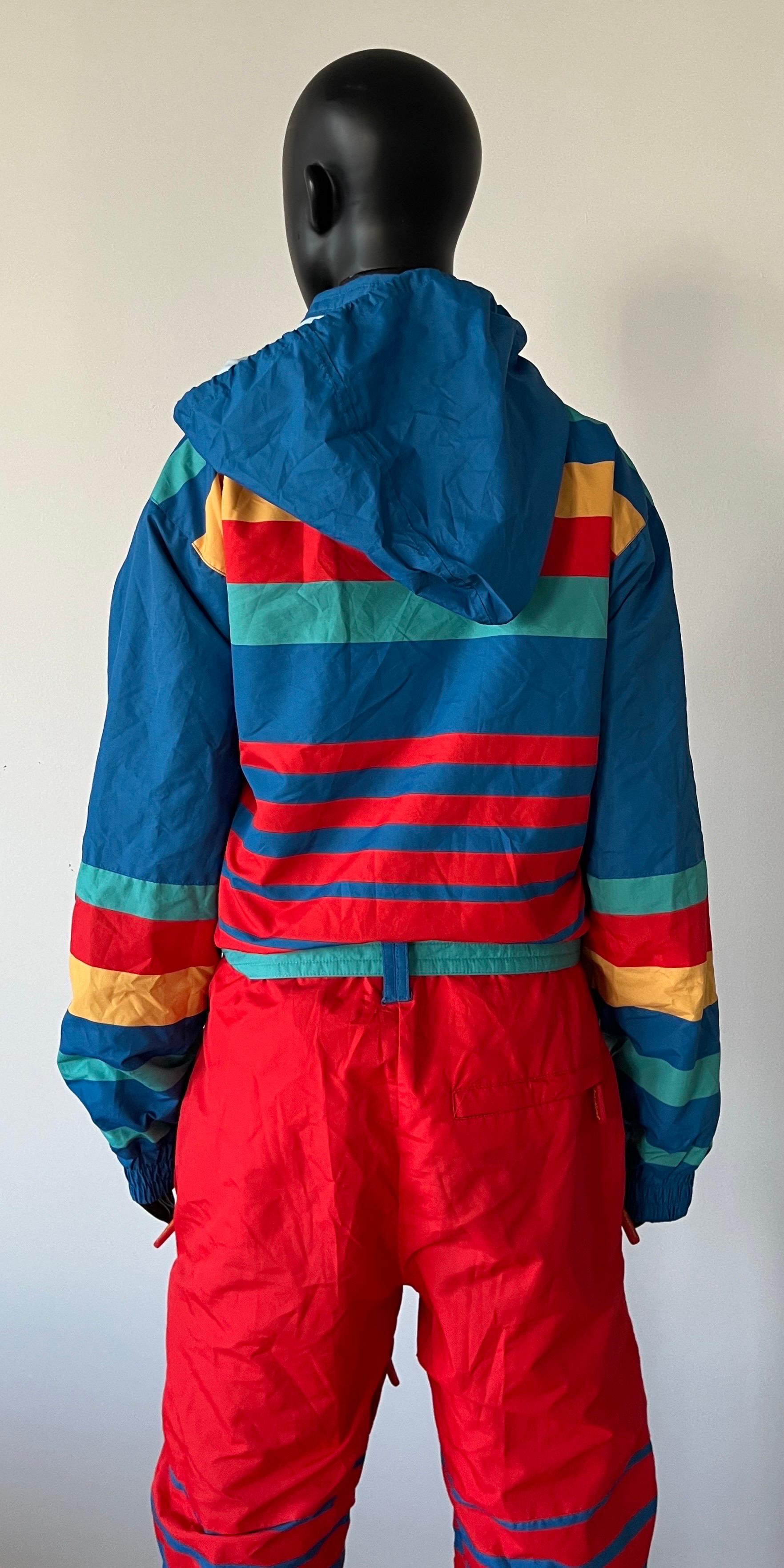 Very retro style  ski suit Jumpsuit in  colour. 

Good vintage condition. 

Size small - medium 

Made in