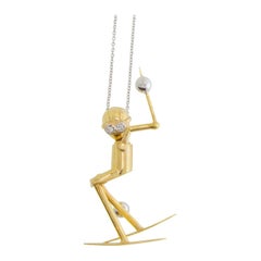 Skier Pendant in 18 Karat Gold with Diamonds