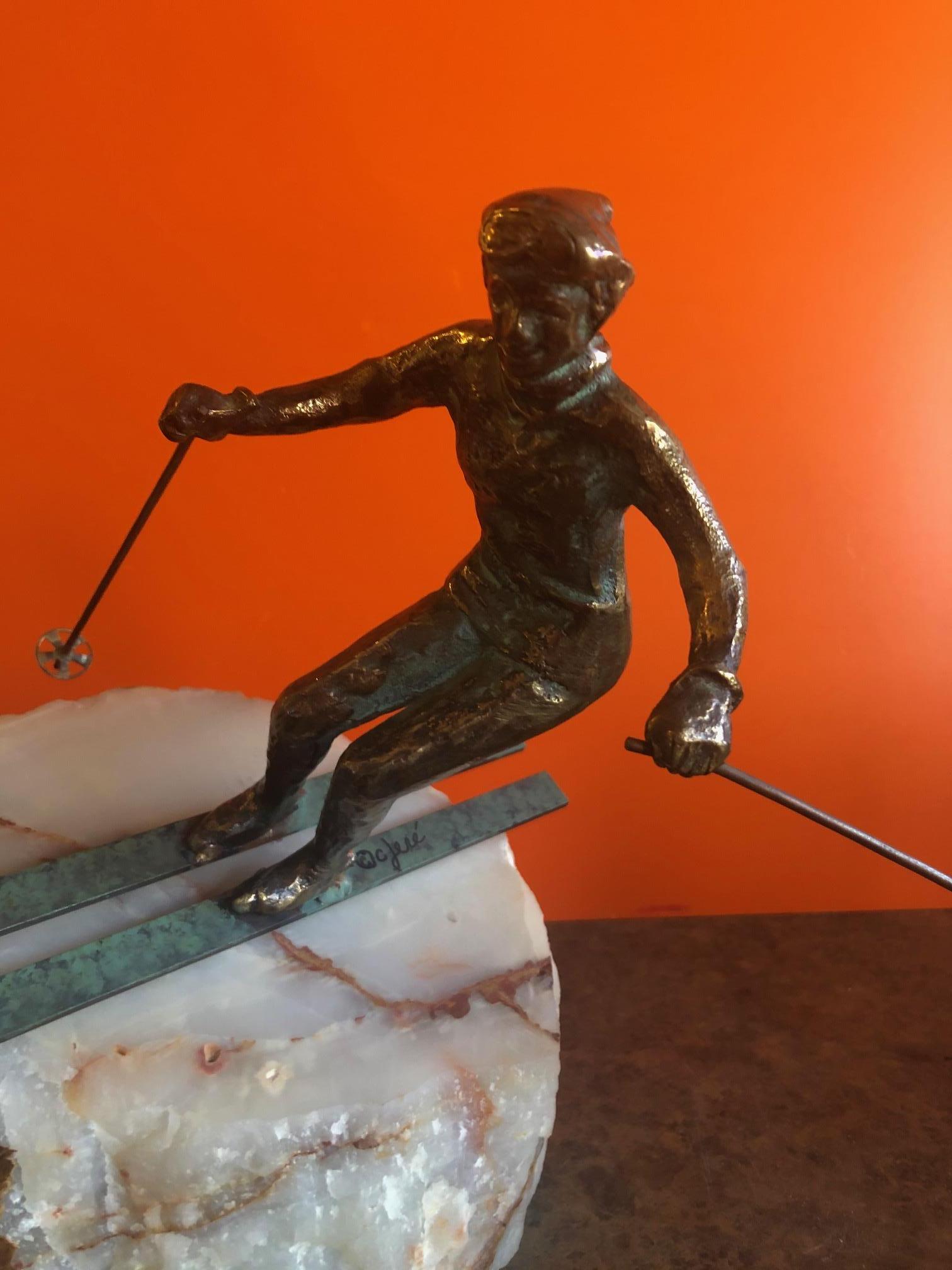 Skier Sculpture on Onyx Base by C. Jere 1