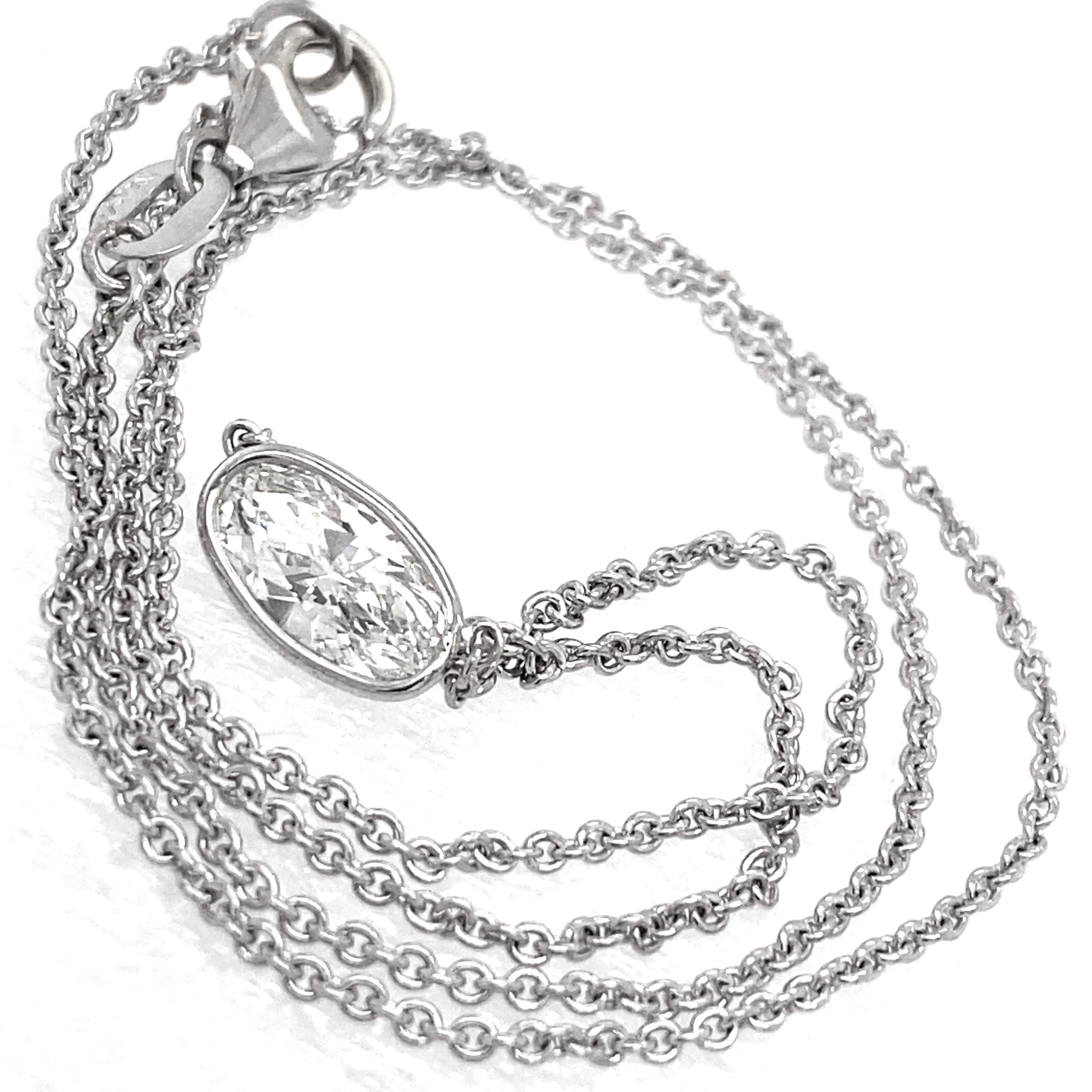 This necklace features a diamond we've had in the shop for a while, but it never really found the right ring setting, being a bit on the  skinny side.  The Boss finally decided its elongated shape would look better on a neck than on a finger. 

The