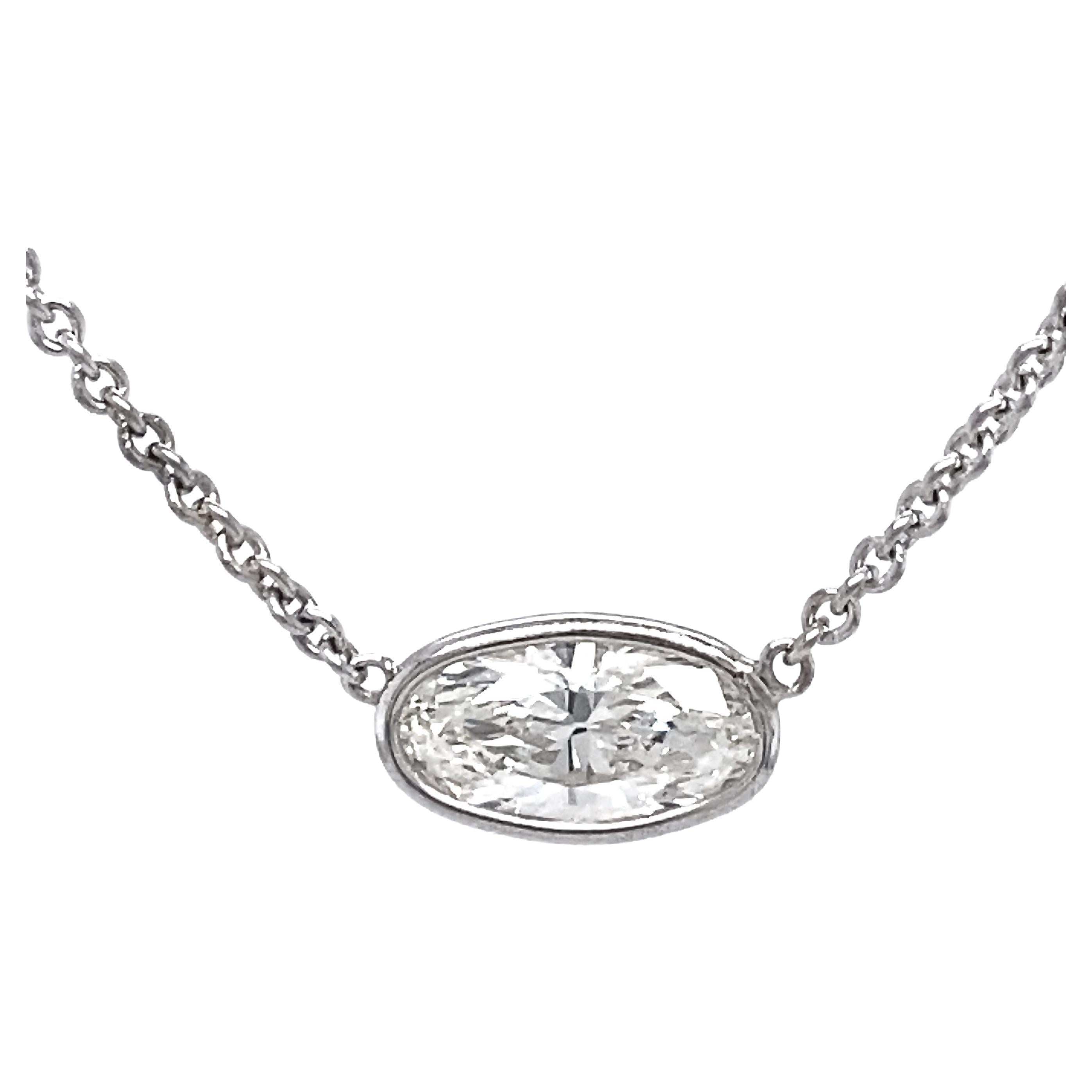 Diamond Solitaire Necklace with 0.73 Carat G-VS1 Skinny Oval Set in White Gold For Sale