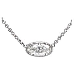 Diamond Solitaire Necklace with 0.73 Carat G-VS1 Skinny Oval Set in White Gold