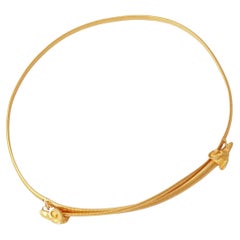 Skinny Gold Stretch Belt with Ram's Head Buckles, 1980s