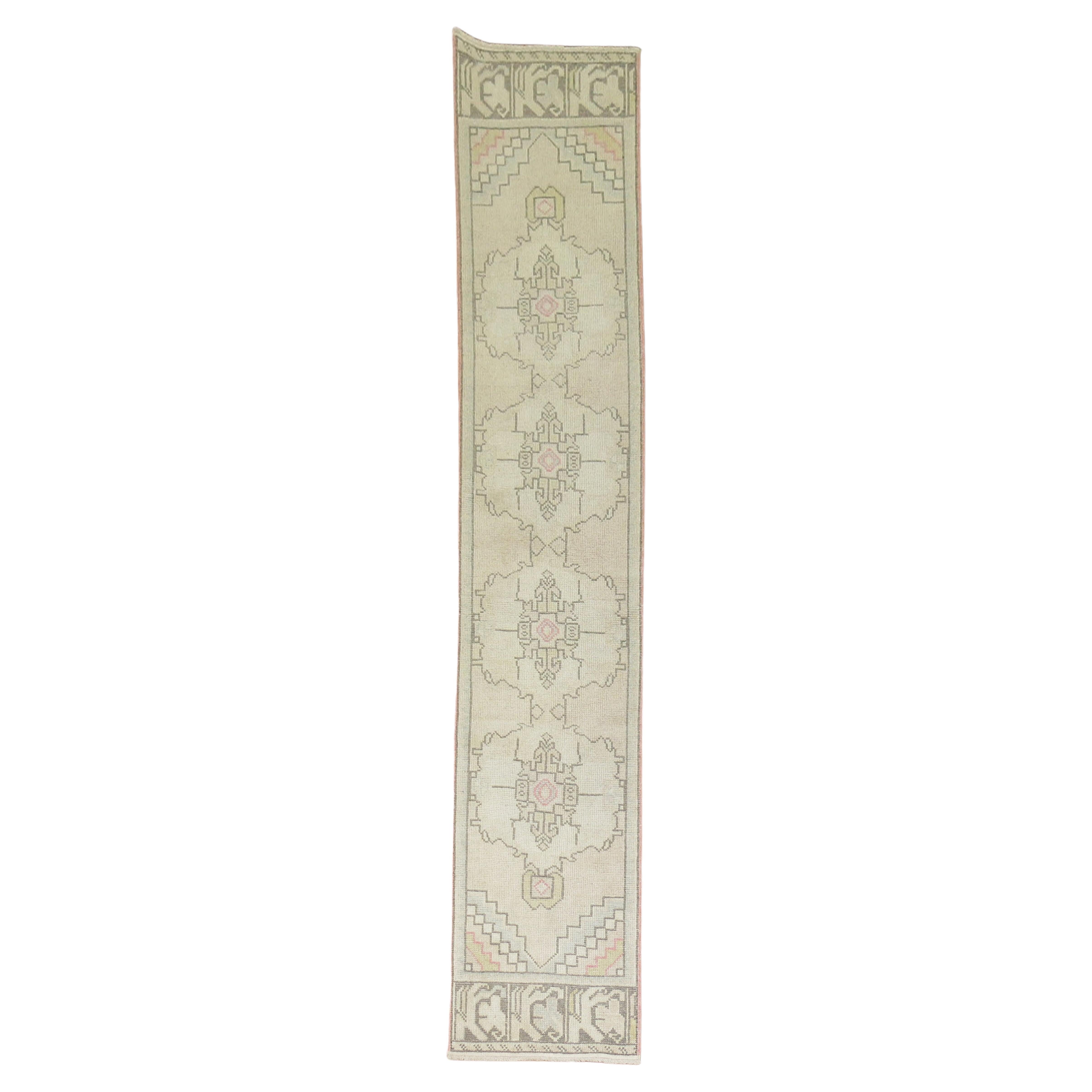 A mid-20th century geometric skinny Turkish runner

Measures: 1'10'' x 9'3''.