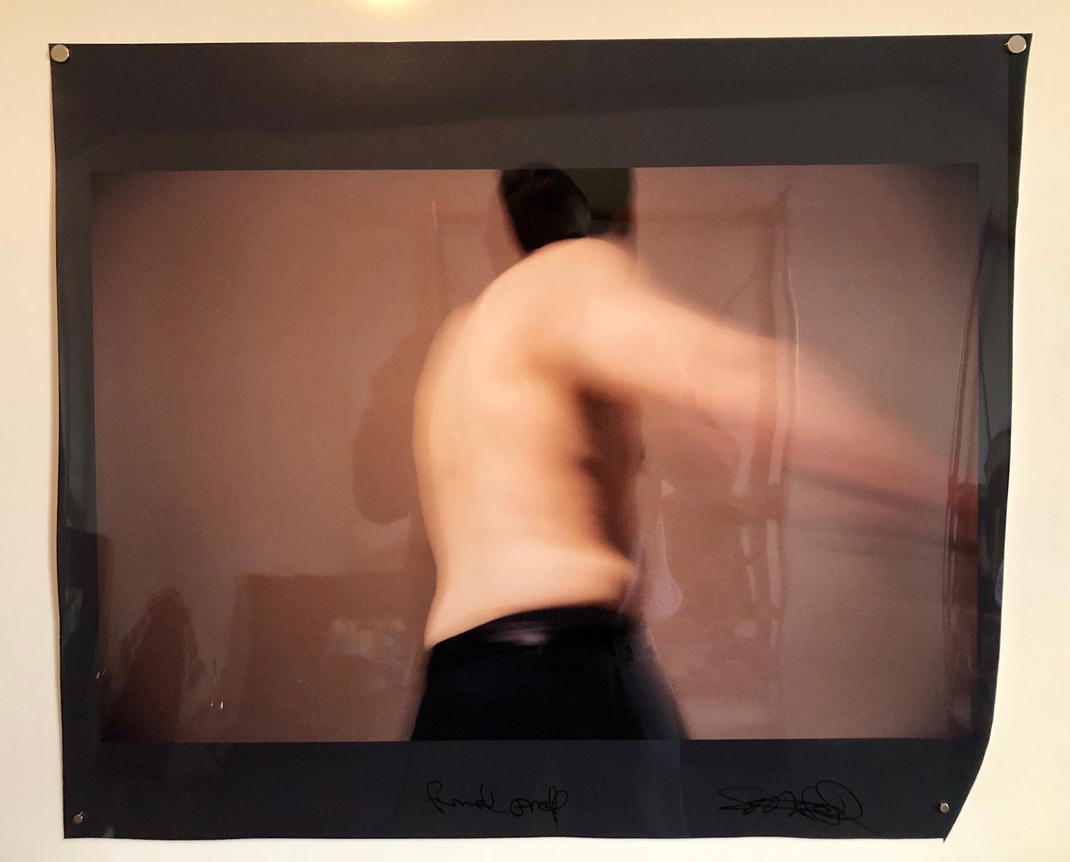 C-print on pearlescent photographic paper. Signed and inscribed Final Proof. Unevenly cut borders. dancing shirtless sideways with arm out.

Skip Arnold was born in Binghamton, New York and currently lives and works in Marseille, France. 
Skip