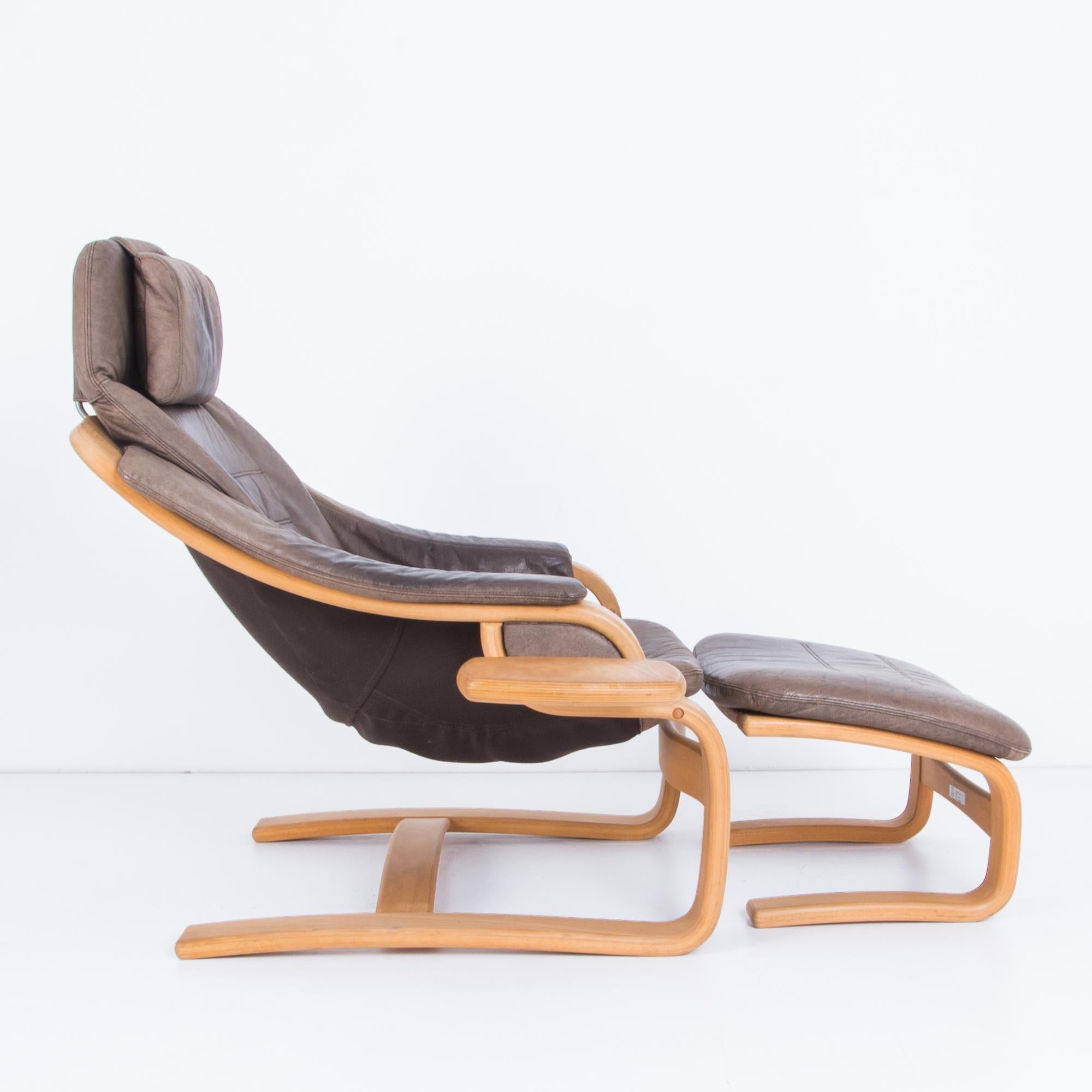 leather armchair with footrest