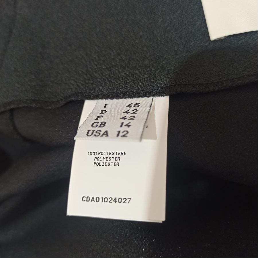 Polyester Black color Drape on lesft side Total length cm 57 (2244 inches) Waist cm 40 (1574 inches)
