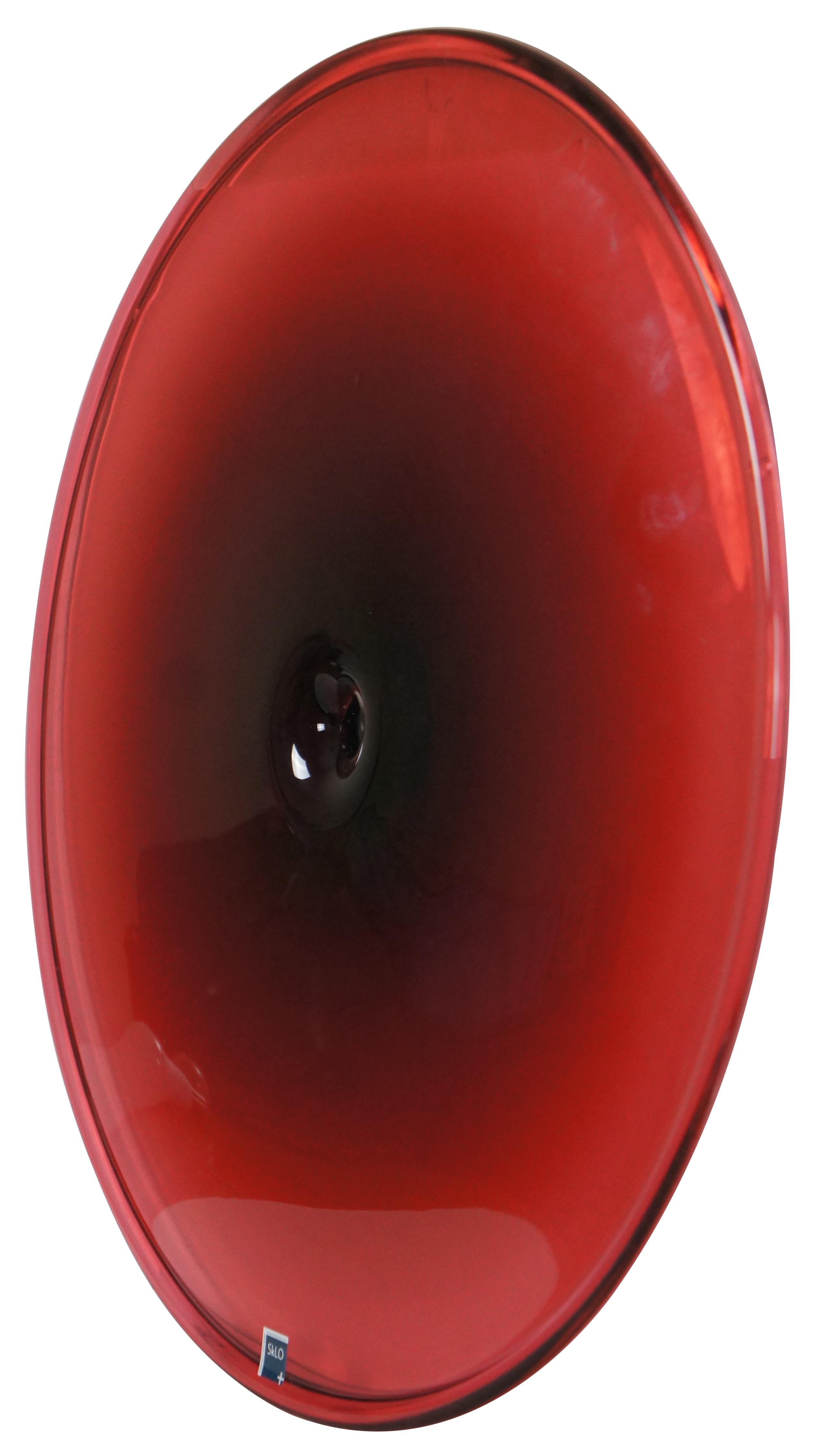 SkOL Studio strawberry / cranberry / red glass Pool wall / tabletop art disc, large size.

“Pool – Object - Discs of handblown glass from Czech Republic with open mouths at the center where the pieces are broken from the glassmaster’s pipe, and