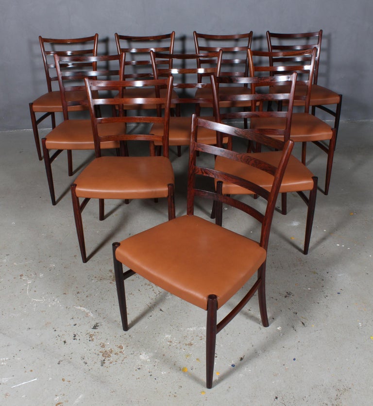 Skovby Møbelfabrik set of four dining chairs in partly solid rosewood.

New upholstered with cognac aniline leather.

Made in the 1960s.