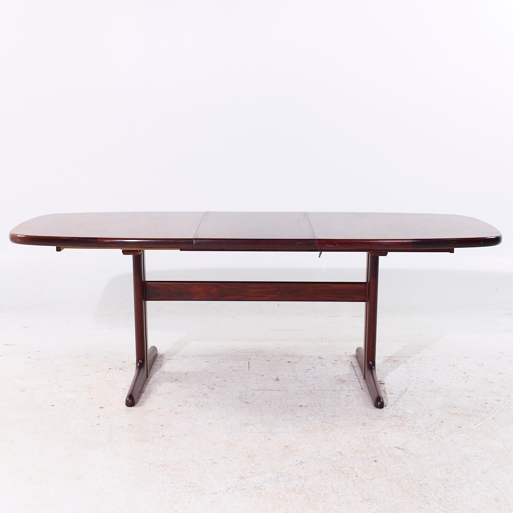 Skovby MCM Danish Rosewood Hidden Leaf Expanding Dining Table with 2 Leaves For Sale 7