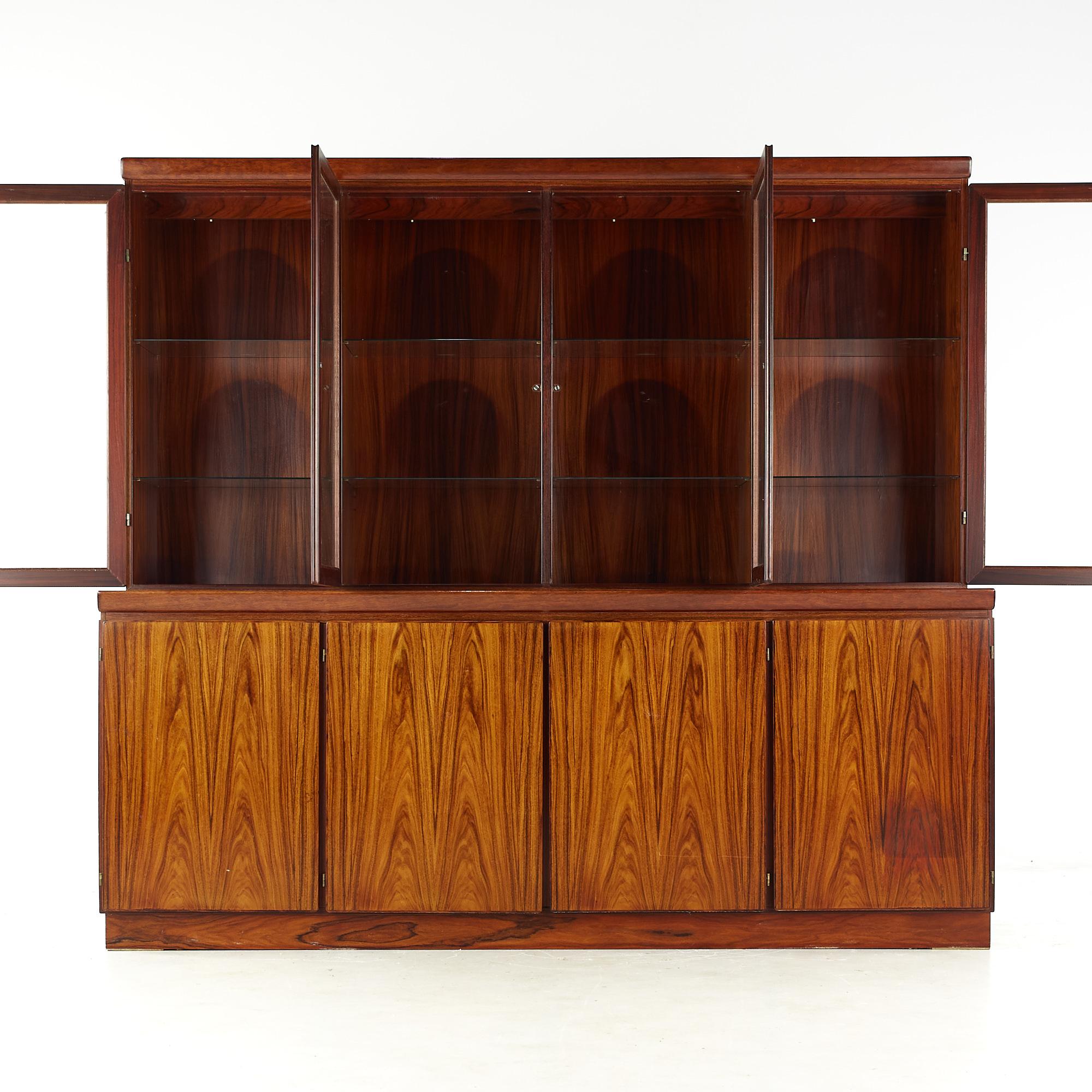 Skovby mid-century Danish rosewood buffet and hutch

The buffet measures: 80.5 wide x 19 deep x 32.5 inches high
The hutch measures: 77.5 wide x 15 deep x 39.5 inches high
The combined height of the buffet and hutch is 72 inches

All pieces of