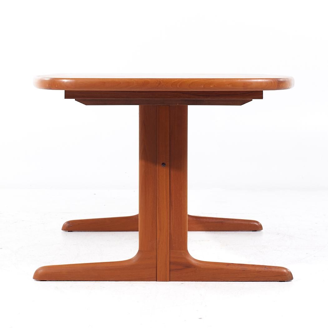 Late 20th Century Skovby Mid Century Teak Hidden Leaf Dining Table with 2 Leaves For Sale