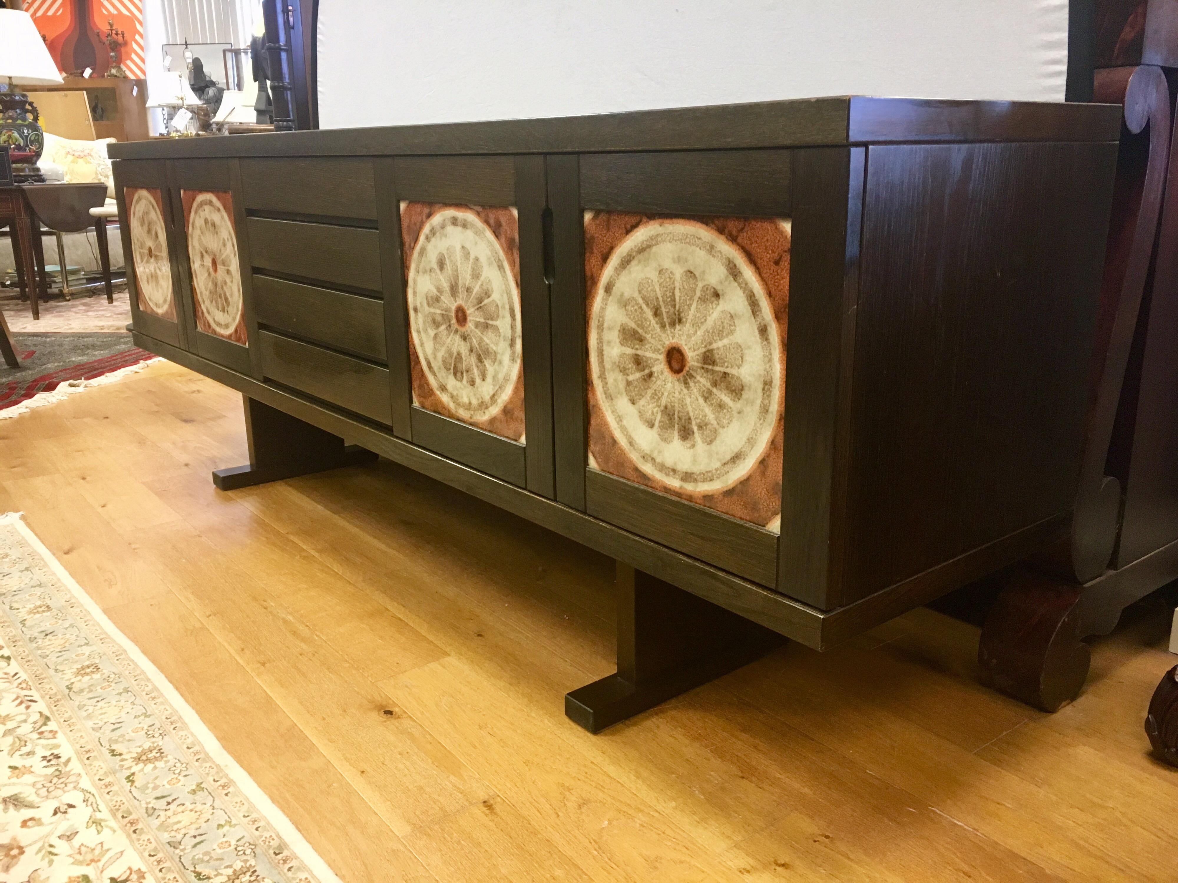 This Poulsen classic, for Gangso Mobler, with ceramic Ox Art tiles adorning the front, is nothing short of iconic Danish Modern! Can be used as a sideboard, bar, server or buffet. Multiple drawers and compartments include two felt drawer for your
