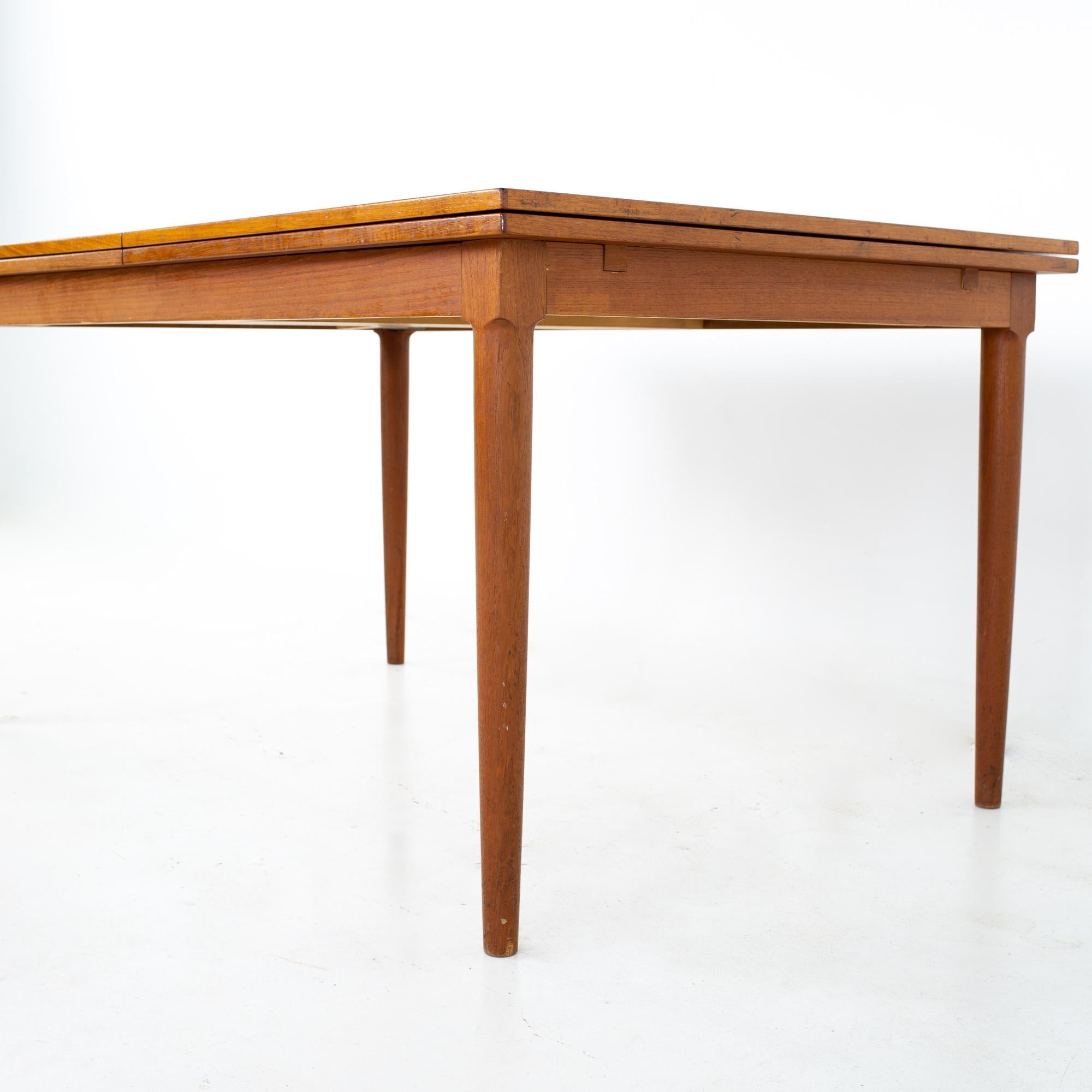 Skovmand and Andersen Mid Century Teak Hidden Leaf Dining Table In Good Condition In Countryside, IL