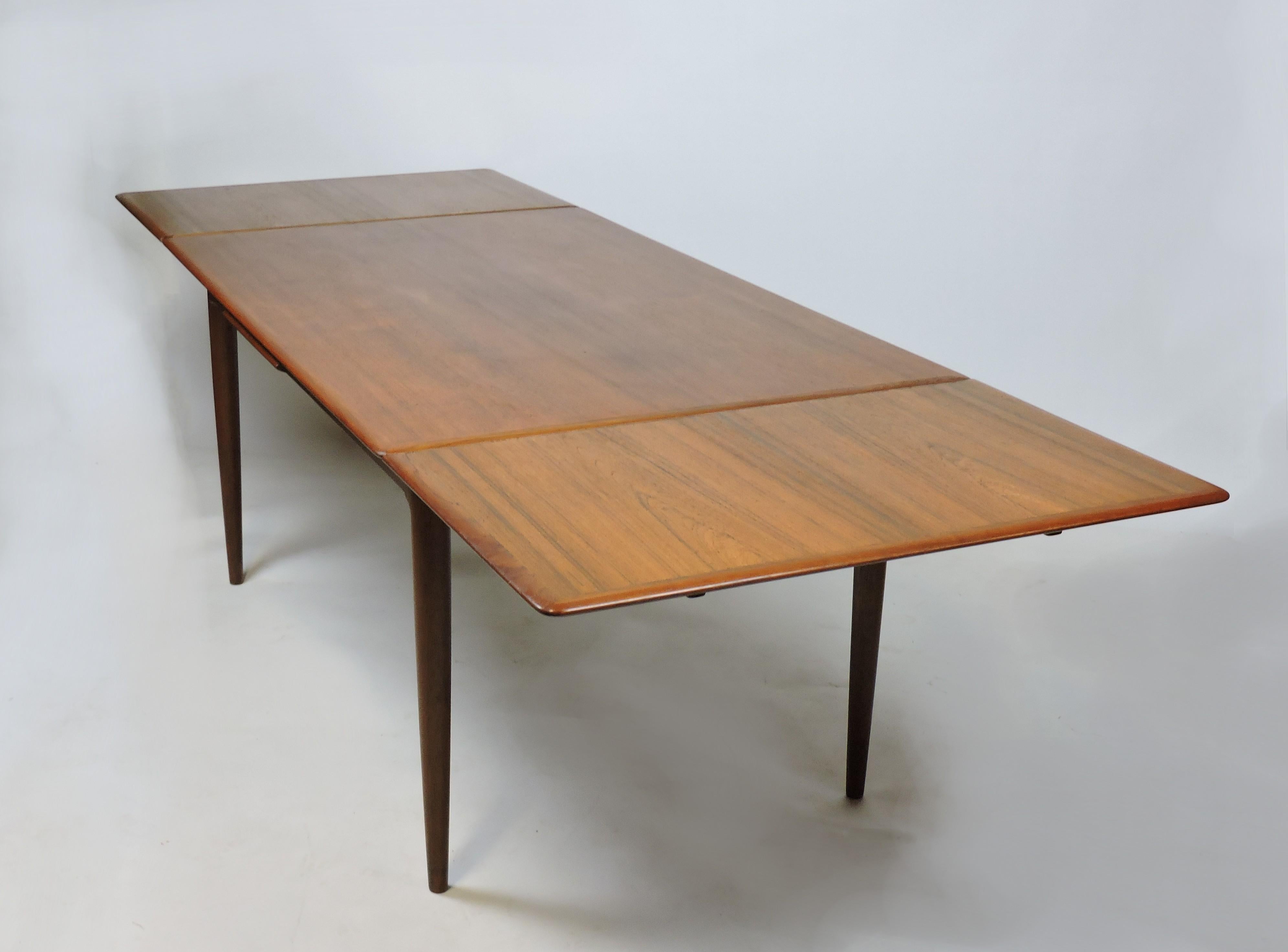 Mid-20th Century Skovmand Andersen Danish Modern Teak Extendable Dining Table Self-Storing Leaves
