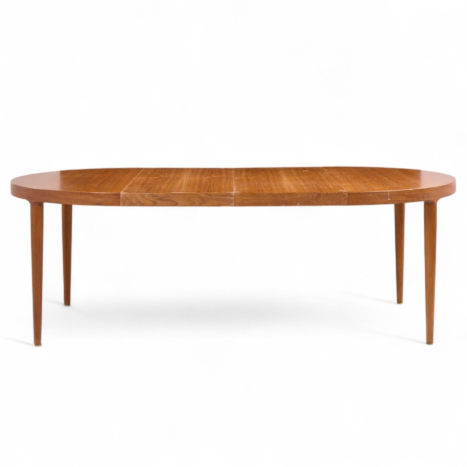 Skovmand & Andersen for Moreddi Mid Century Danish Teak Expanding Dining Table with 2 Leaves

This table measures: 47.25 wide x 47.25 deep x 29 inches high, with a chair clearance of 26.5 inches, each leaf measures 19.75 inches wide, making a