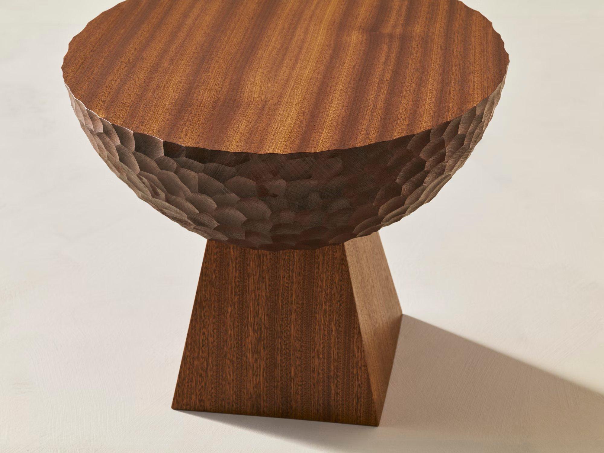 The charming smaller sibling of the SKL. Hand-carved from solid premium timber, the SKS (Small Key Star Side Table) is a sculptural showcase of classic craftsmanship. Precise angles and a silky-smooth top contrast with the intricate hand carving,
