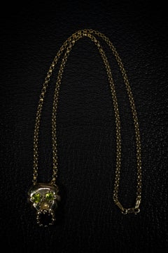 Skull and Soul (10K, Peridot, and Garnet Pendant) by Ken Fury