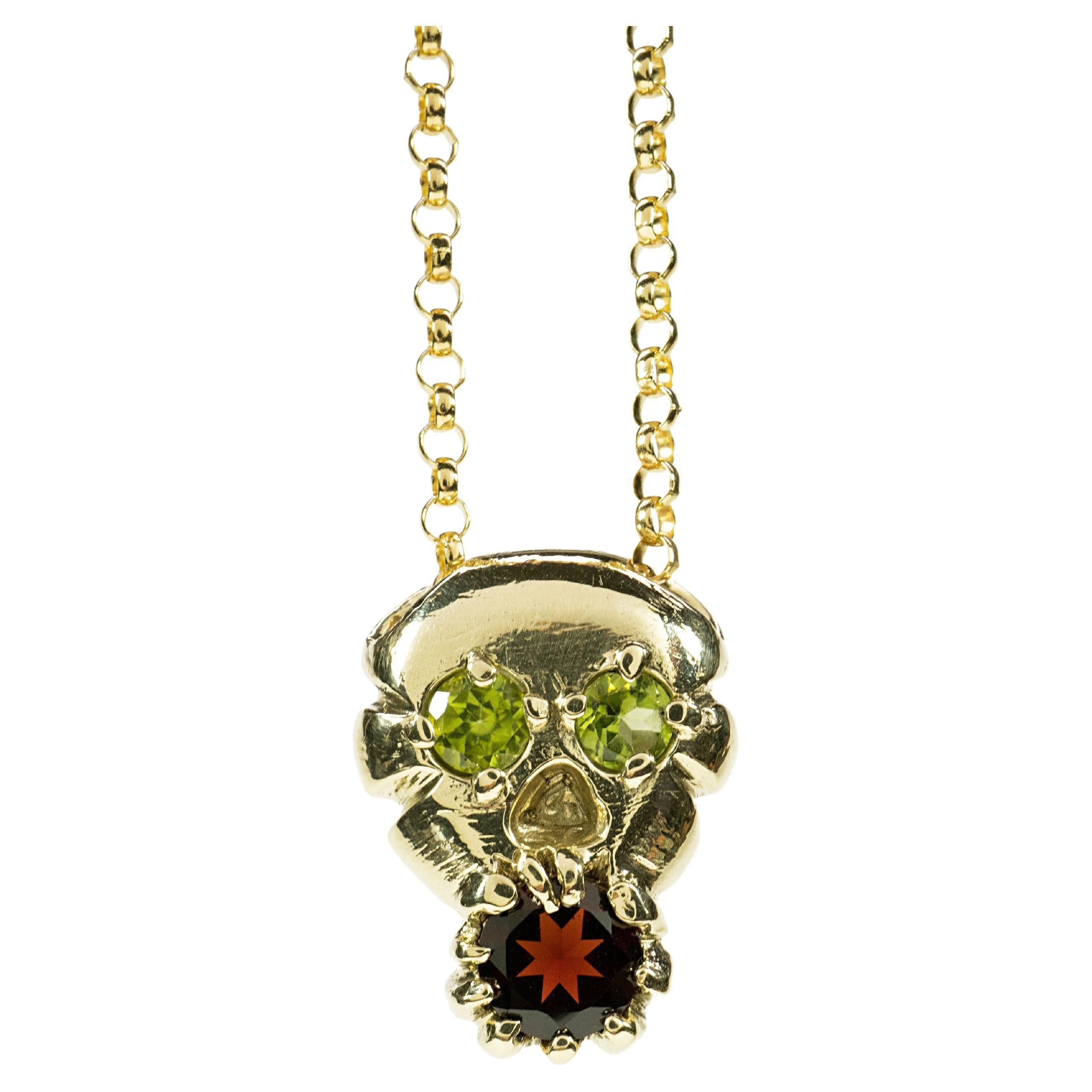 Skull and Soul (10K, Peridot, and Garnet Pendant) by Ken Fury For Sale
