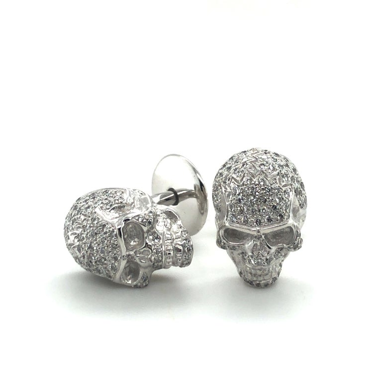 These three-dimensional skull cufflinks in 18 karat white gold from Di Lenardo & Co. are set with a total of 166 brilliant-cut diamonds of G/H colour and vs clarity with a total weight of approximately 0.83 carats.

Fixed stud cufflinks with