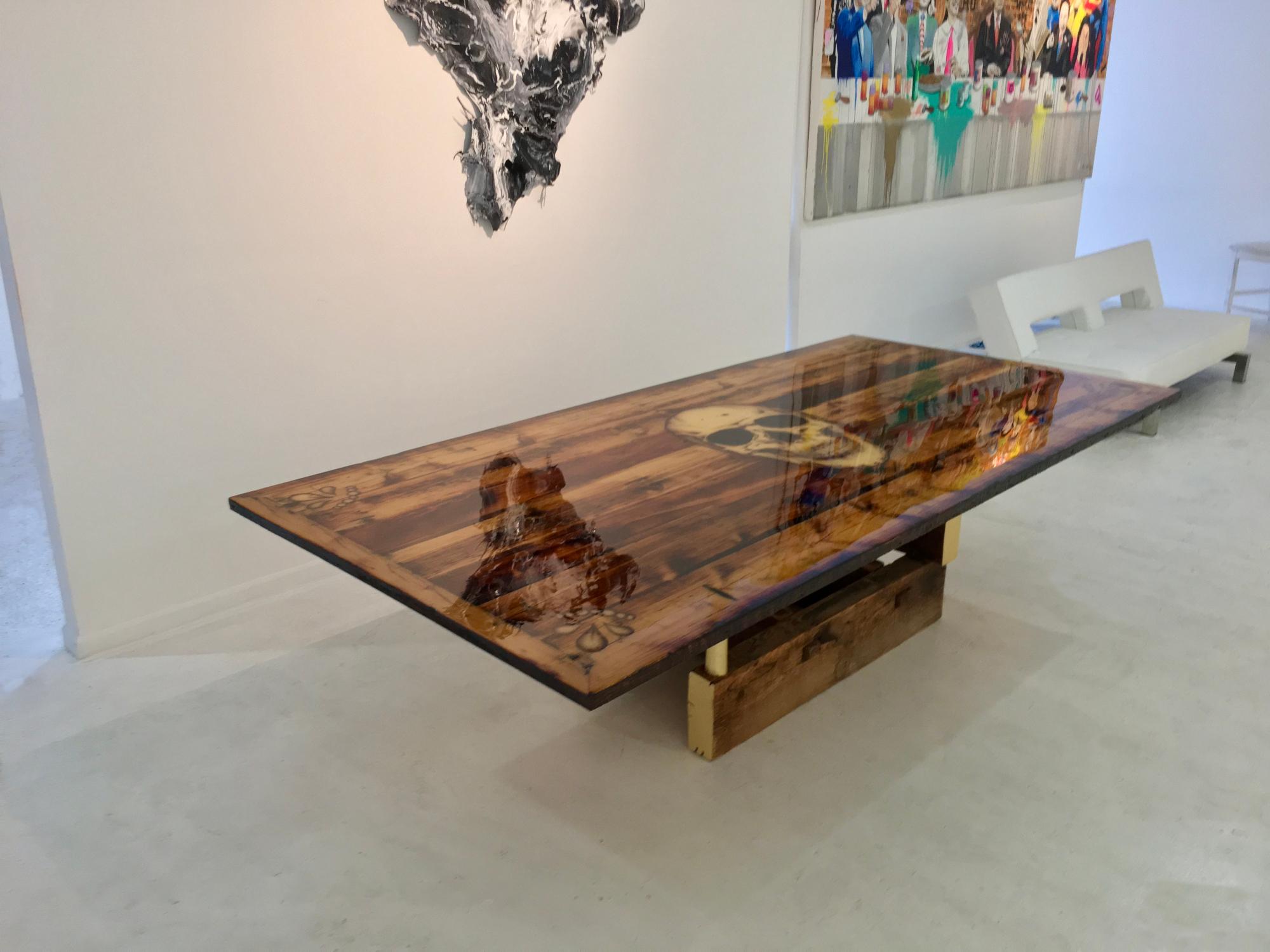 Rafael designed and handcrafted the Skull Dining Table from the reclaimed 150-year-old Douglas fir beams he salvaged from Manhattan townhomes. Their surfaces are aged with a beautiful golden brown patina; saw marks, nails, bolt holes, and natural