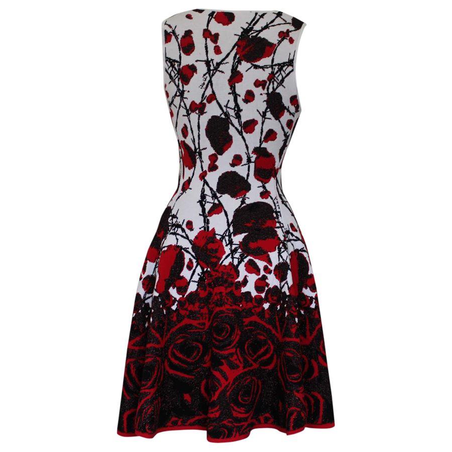 Viscose (65%) polyester and cupro Skull theme Red white and black Sleeveless Total length cm 86 (33.8 inches)
