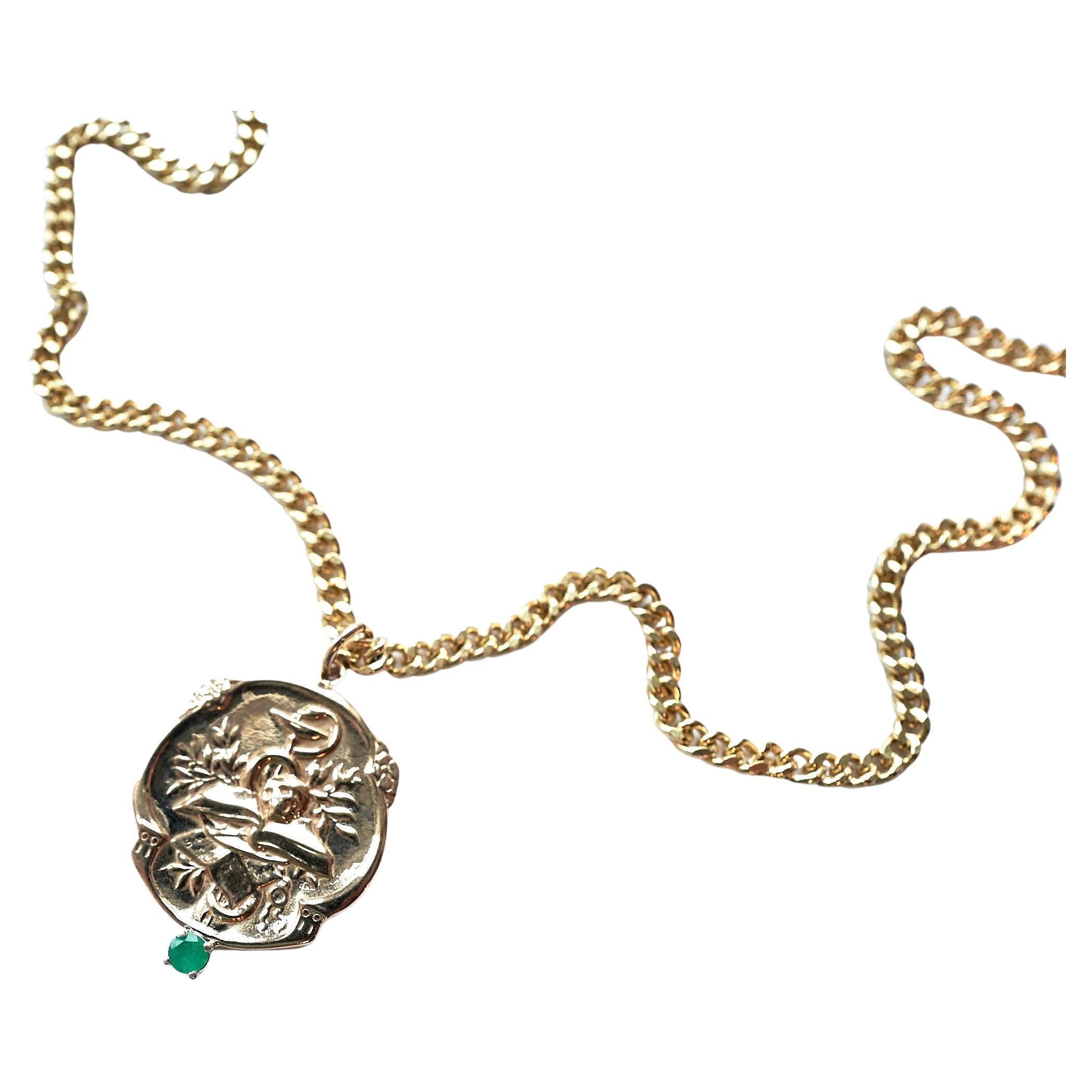 Emerald Victorian Style Memento Mori Medal Necklace Skull Chain J Dauphin
Gold Plated Brass Chain and Bronze Medal

Symbols or medals can become a powerful tool in our arsenal for the spiritual. 
Since ancient times spiritual pendants, religious