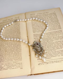 Skull, Garnet, freshwater pearl and crystal necklace by Sebastian Jaramillo