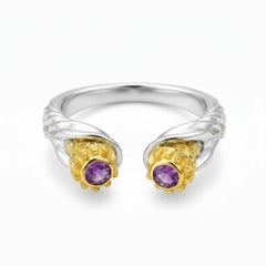 Skull ring with amethyst in silver, gold